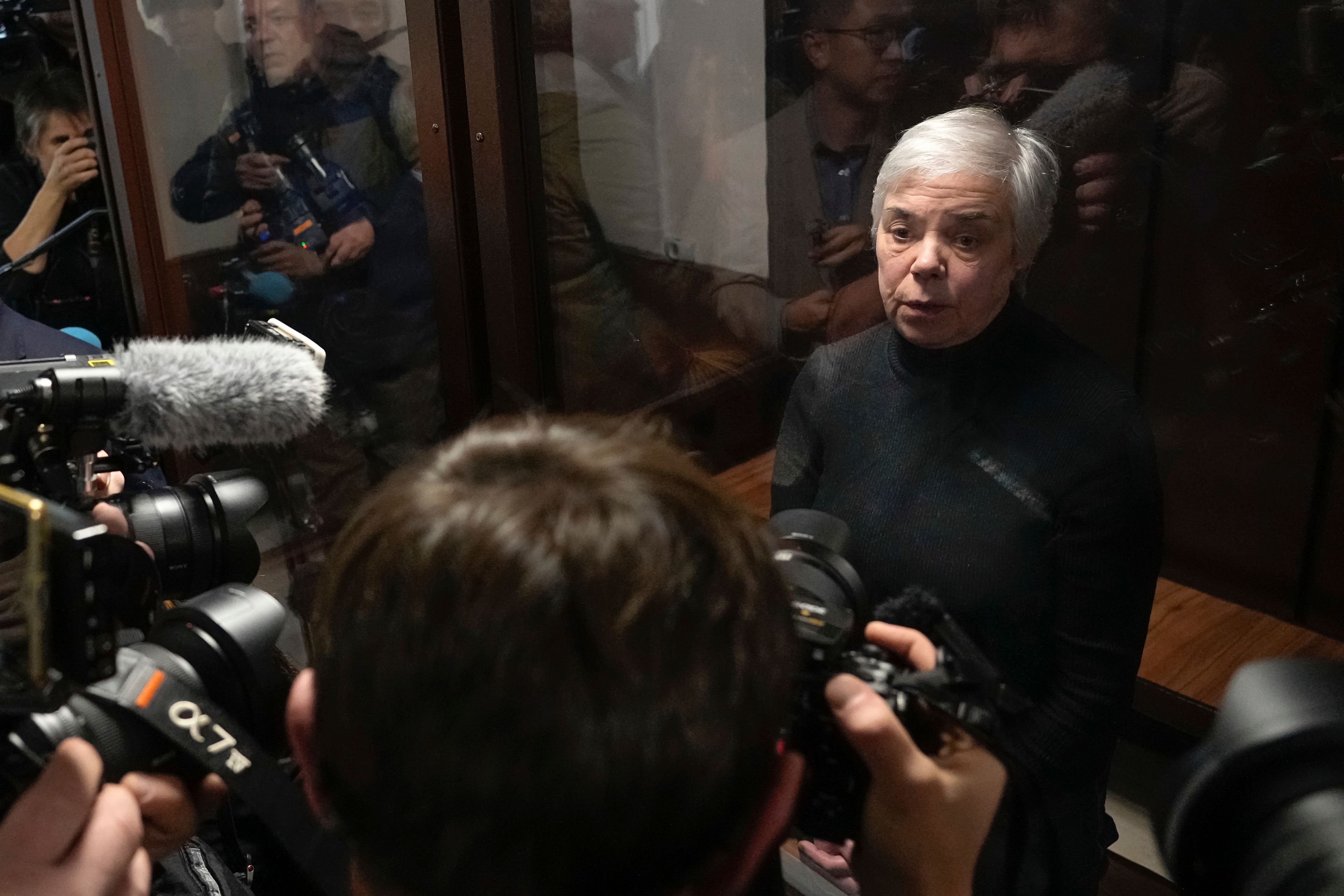 Pediatrician Nadezhda Buyanova, accused of spreading false information about the army, speaks to the media prior to a hearing in the Tushinsky District Court in Moscow, Russia, Tuesday, Nov. 12, 2024. (AP Photo/Pavel Bednyakov)