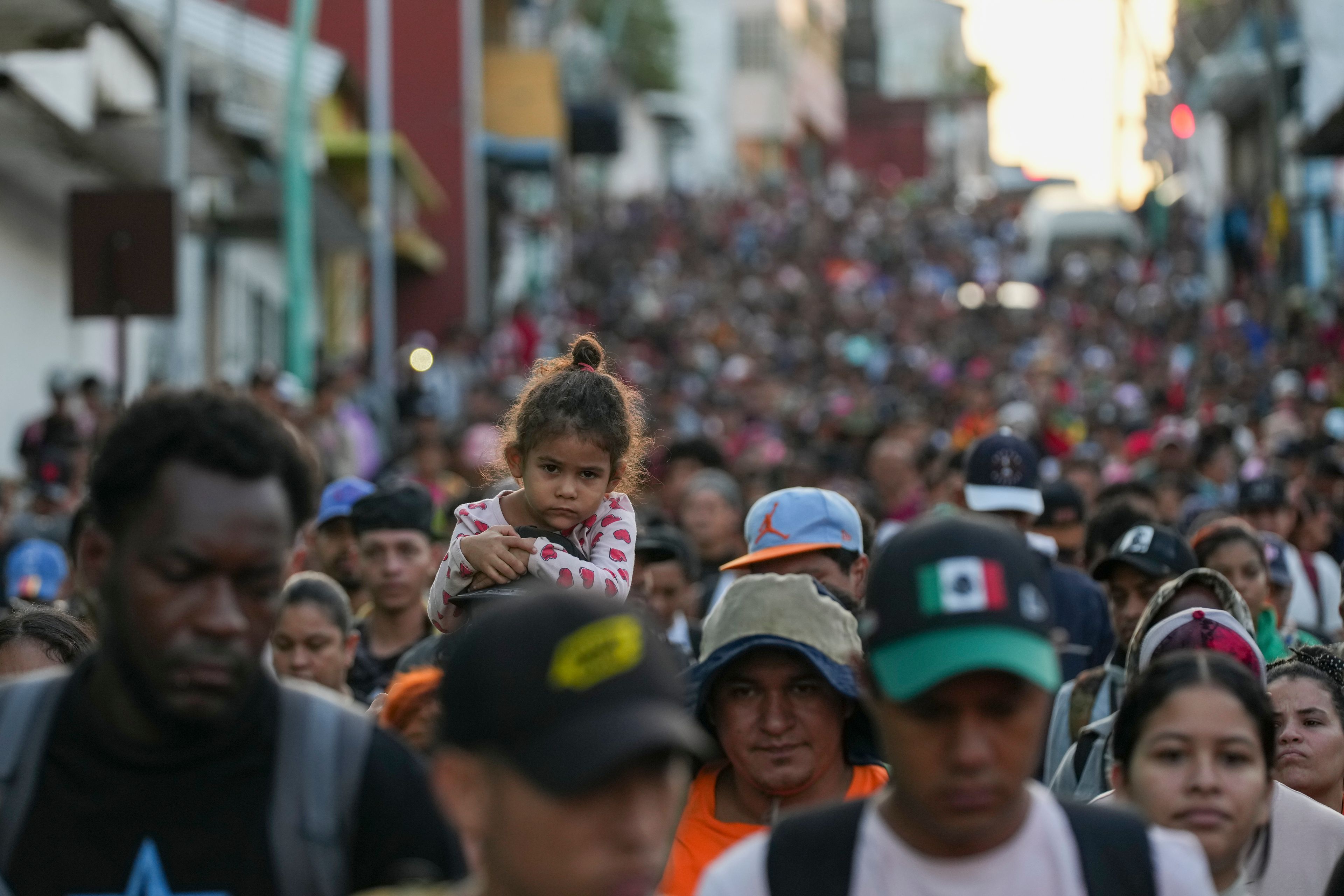 Migrants depart Tapachula, Mexico, hoping to reach the country's northern border and ultimately the United States, Tuesday, Nov. 5, 2024. (AP Photo/Moises Castillo)