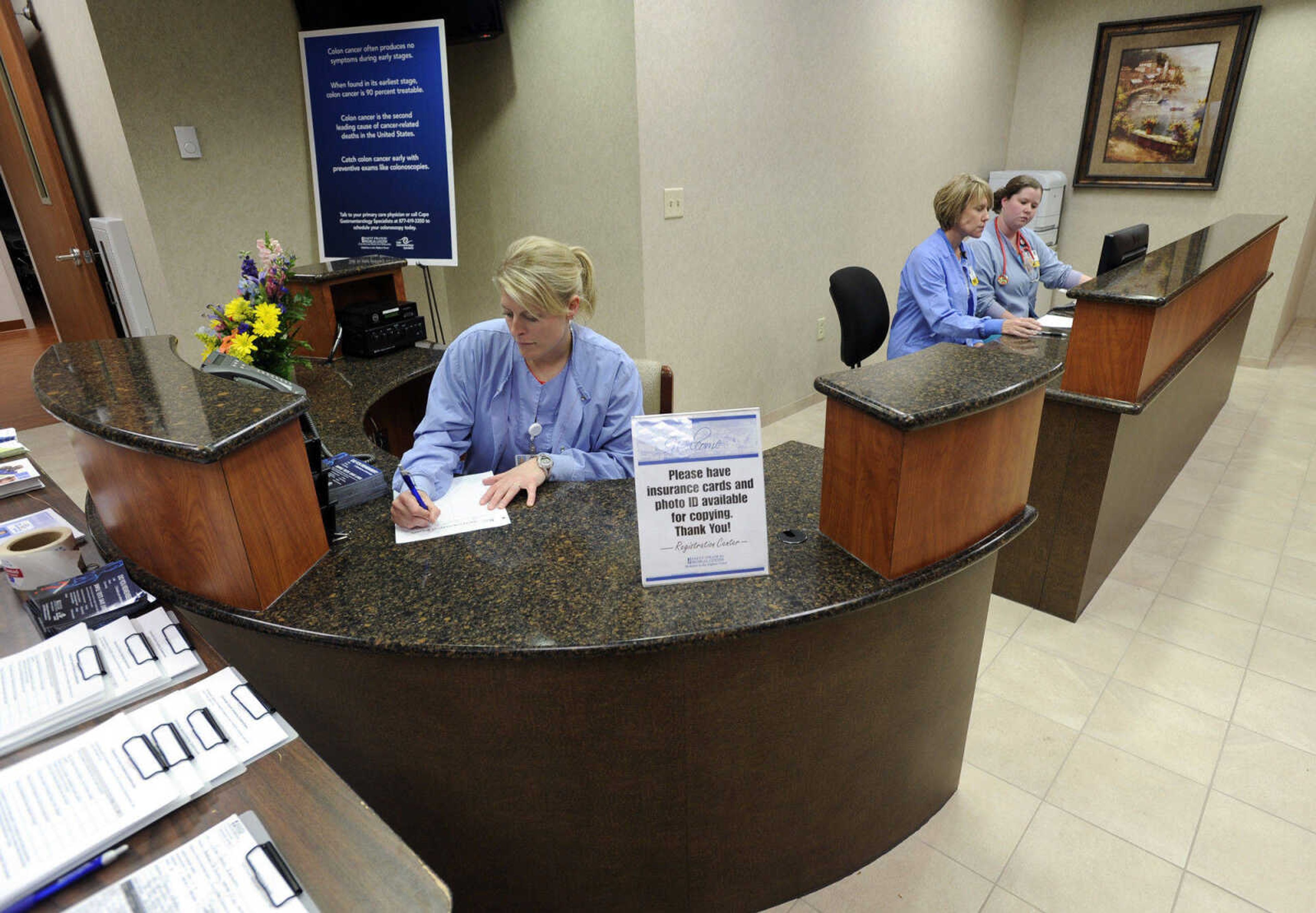 Reception area with registered nurses Michelle Silman, left, Lisa Pieper and Rebecca Tinnin.