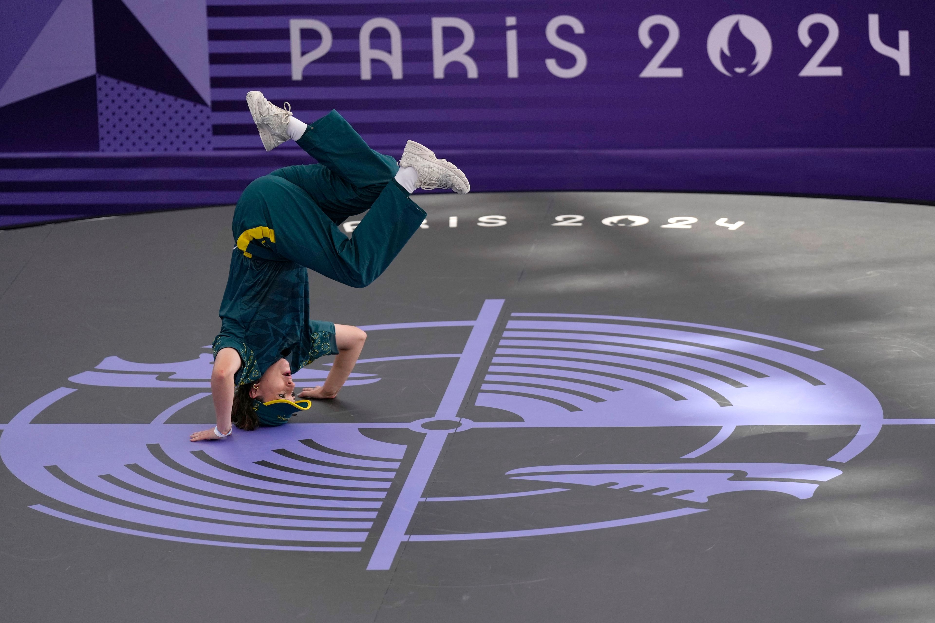 Australia's Rachael Gunn, known as B-Girl Raygun, competes during the Round Robin Battle at the breaking competition at La Concorde Urban Park at the 2024 Summer Olympics, Friday, Aug. 9, 2024, in Paris, France. (AP Photo/Abbie Parr)