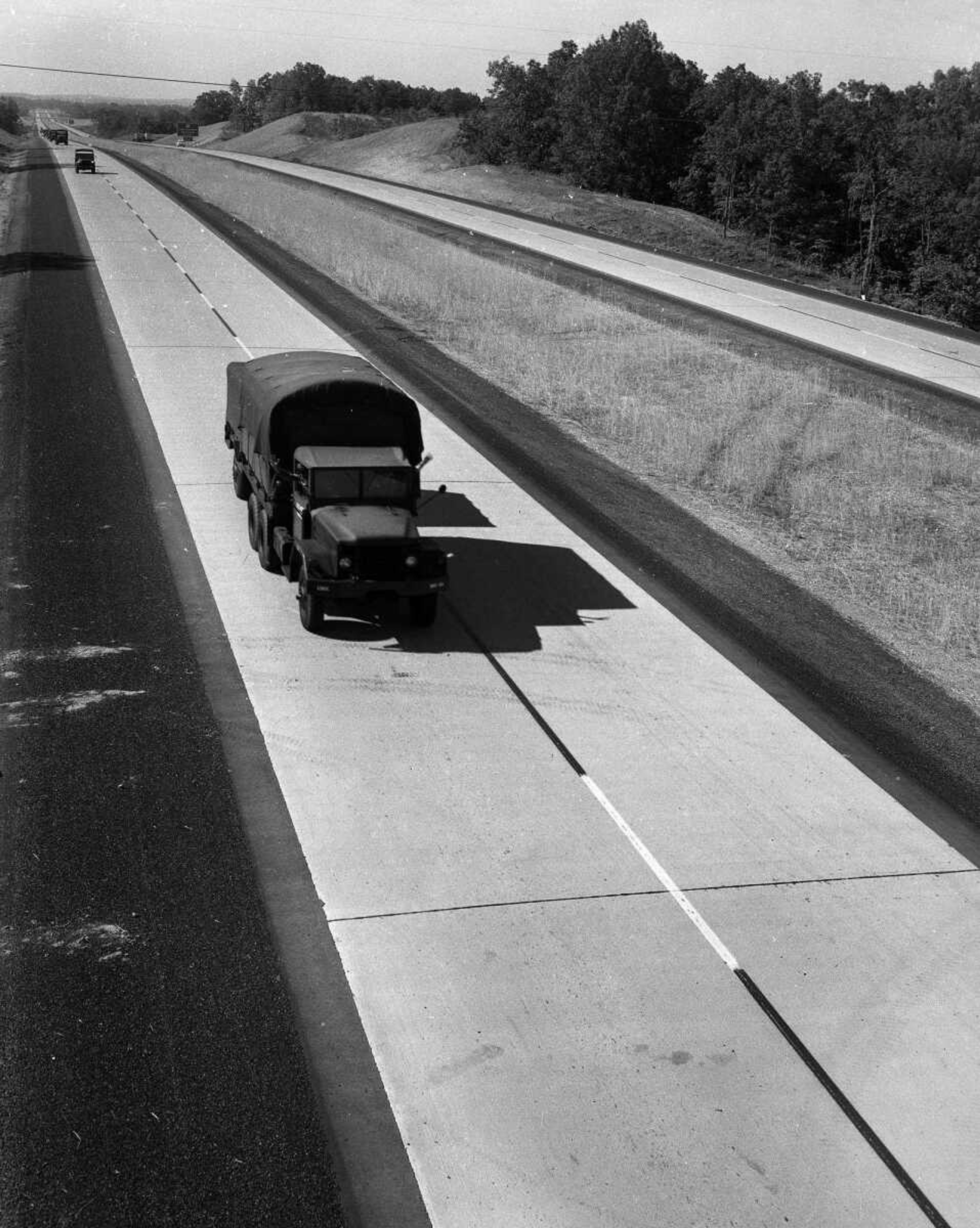 A convoy of National Guard trucks rolled down the highway in this undated photo.