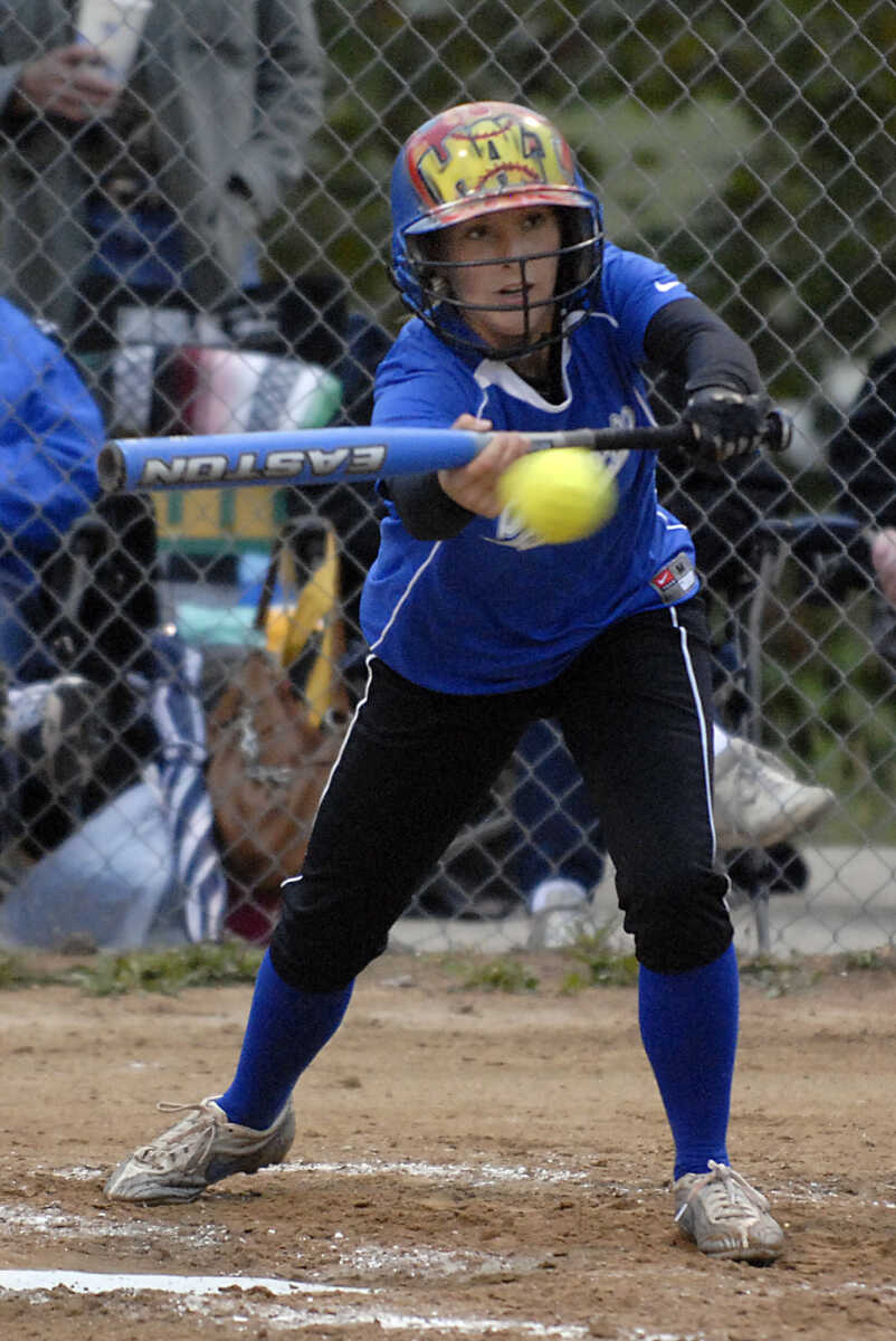 KIT DOYLE ~ kdoyle@semissourian.com
Notre Dame's Hali Rendleman lays down a successful bunt for a hit against DeSoto Thursday, October 15, 2009, in Poplar Bluff.