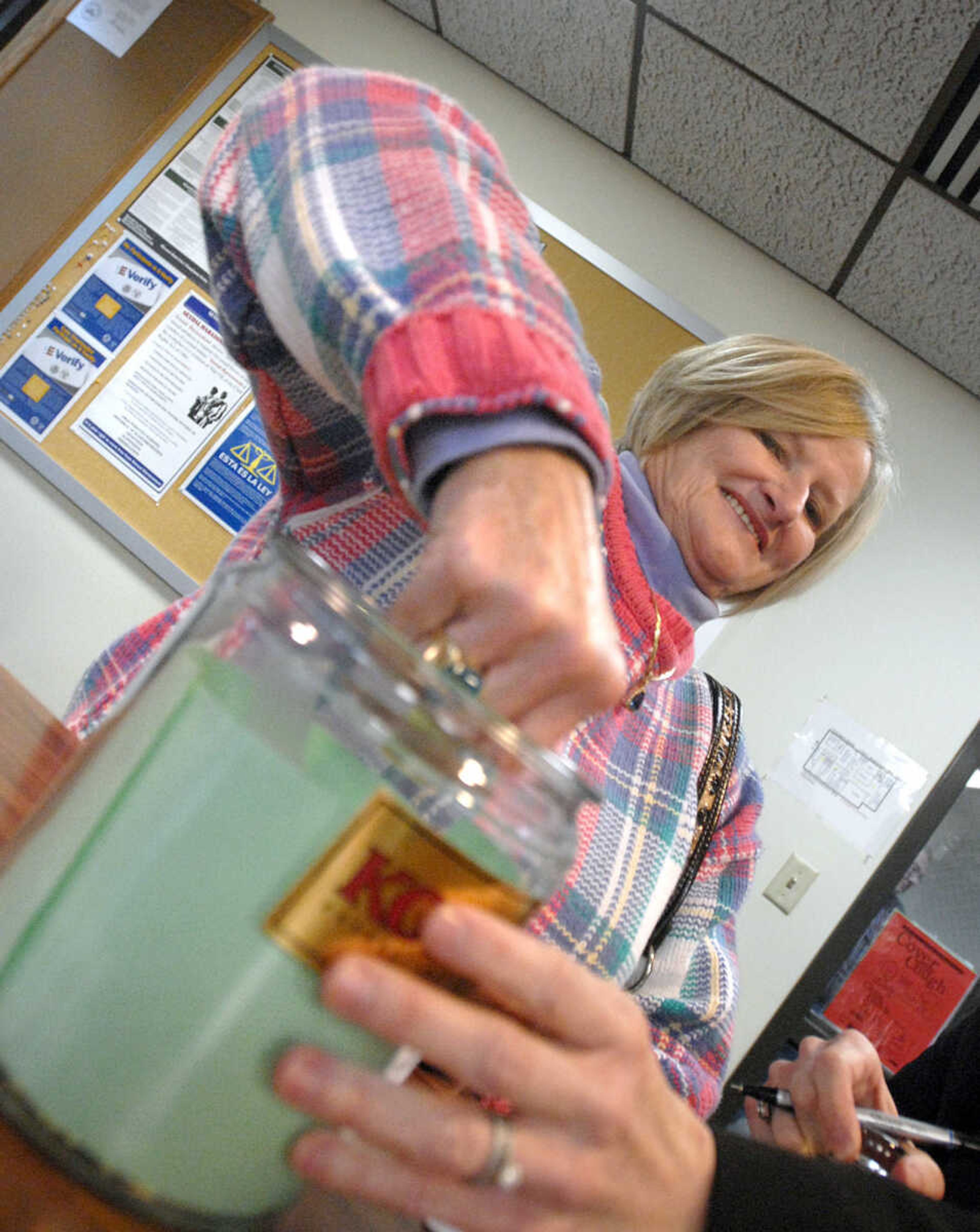 LAURA SIMON ~ lsimon@semissourian.com
Linda Freeman pulls a number from a jar to determine her placement on the ballot this fall. Freeman is running for a GOP committee position.