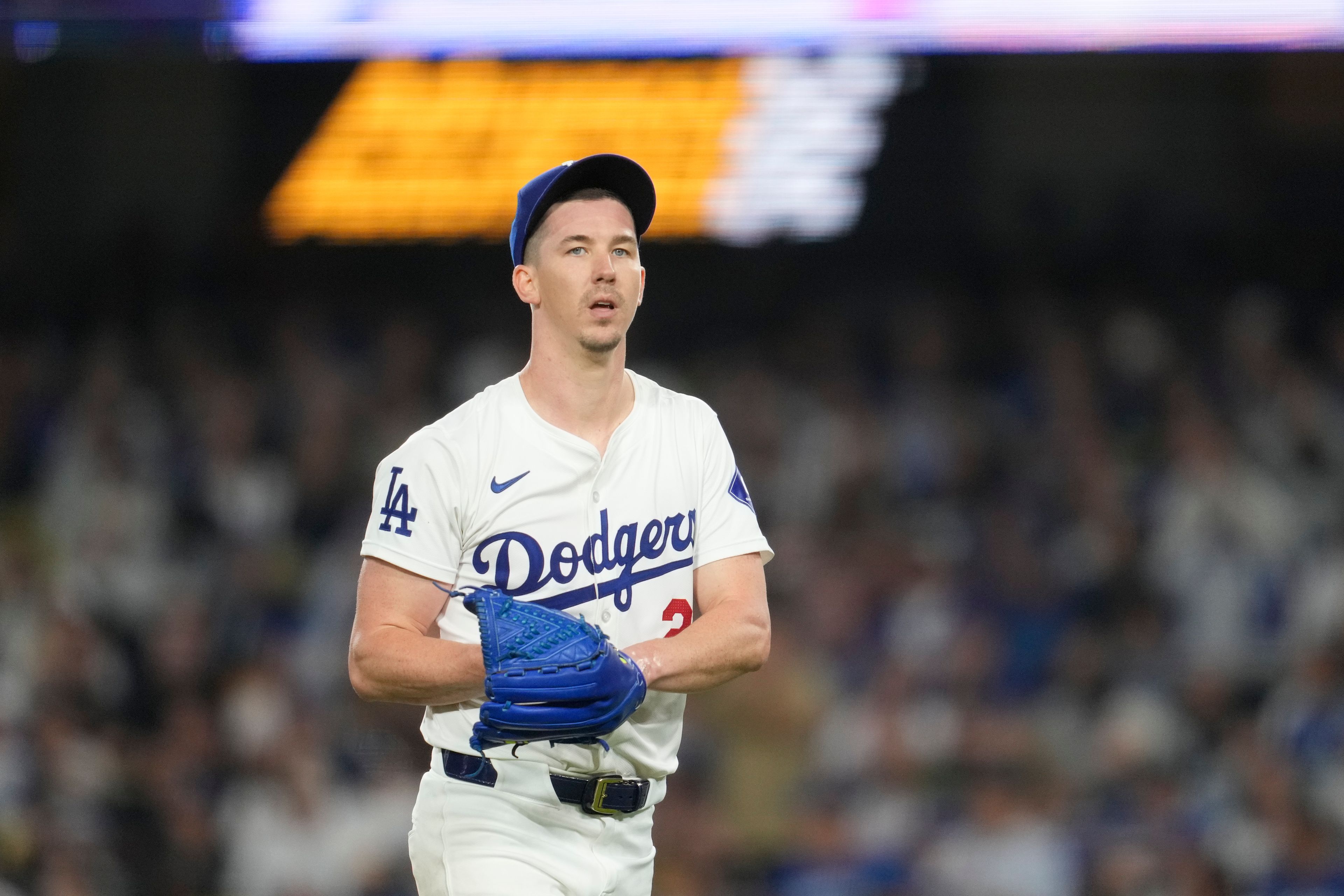 Los Angeles Dodgers starting pitcher Walker Buehler looks on during the fifth inning of a baseball game against the San Diego Padres Thursday, Sept. 26, 2024, in Los Angeles. (AP Photo/Ashley Landis)