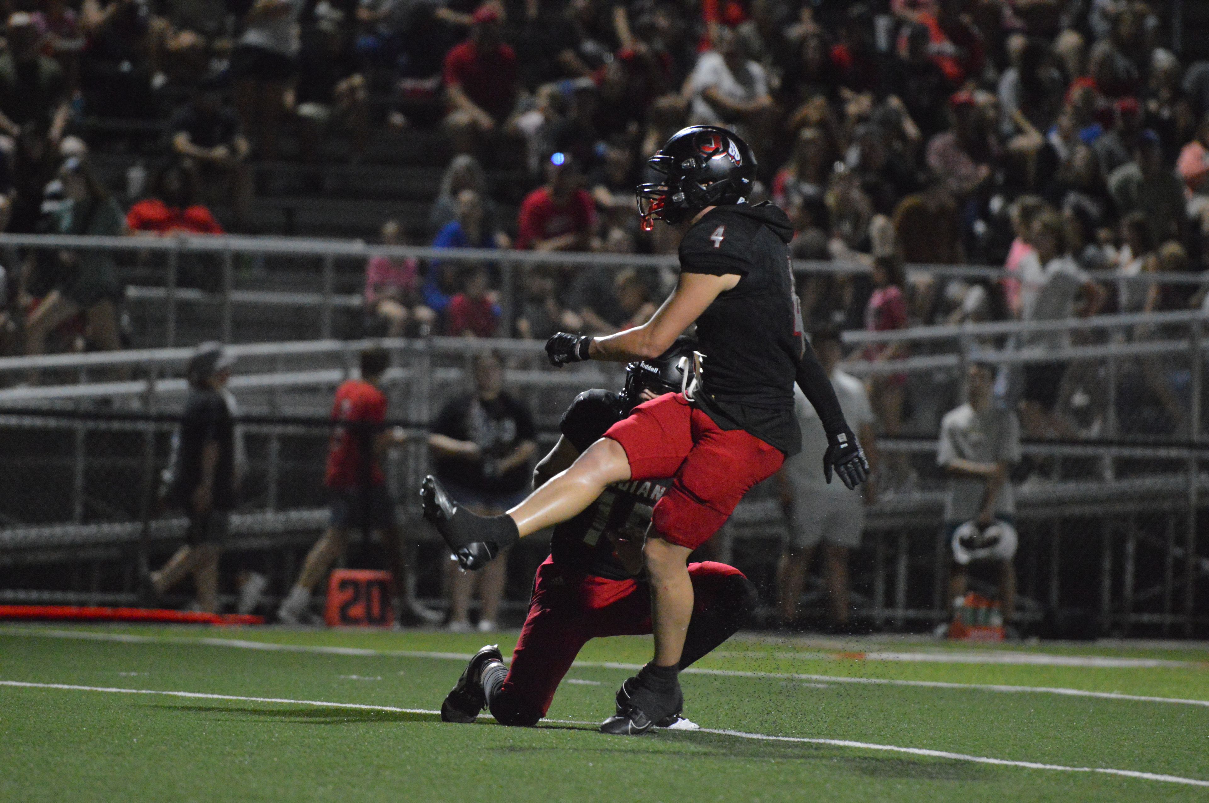 Jackson senior Kai Crowe sends the extra point through the uprights following a touchdown against Farmington on Friday, Sept. 20.