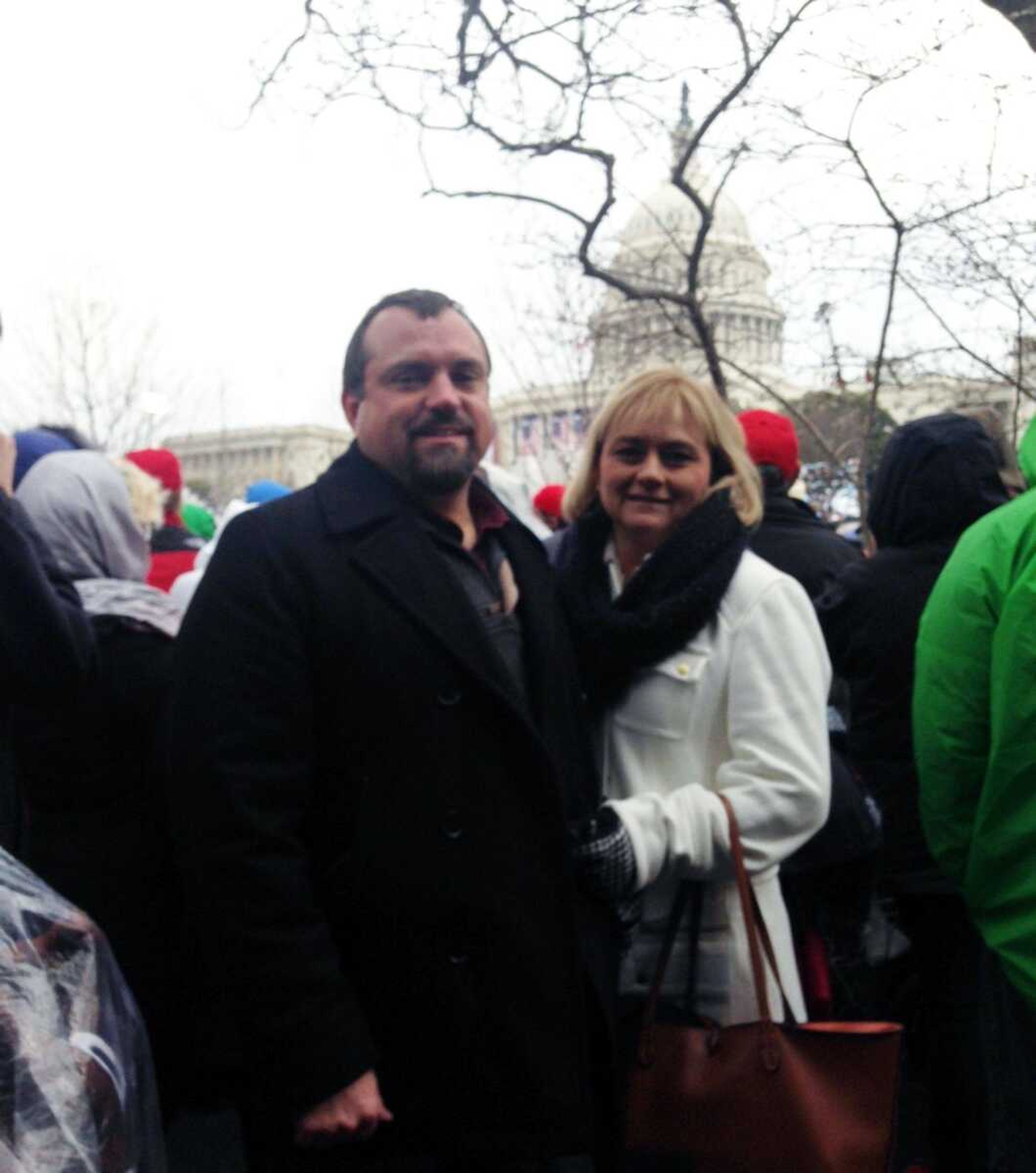 Kevin Colyott and his fiancee, Deborah Griffin, both of Jackson, pose for a photo at the presidential inauguration of Donald Trump on Friday in Washington.