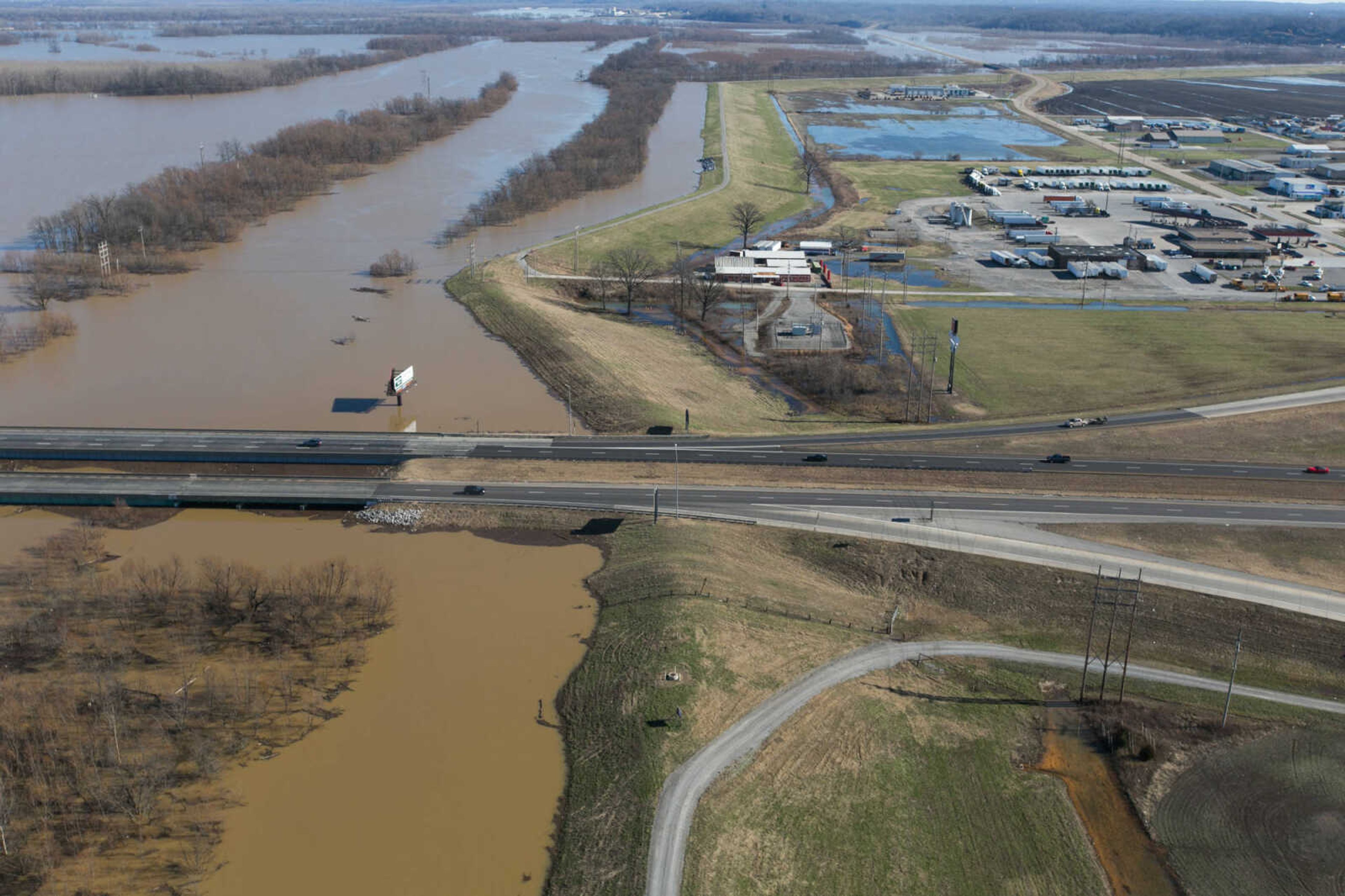 GLENN LANDBERG ~ glandberg@semissourian.com

Floodwater from the Diversion Channel spreads across the horizon near Cape Girardeau, Saturday, Jan. 2, 2016.