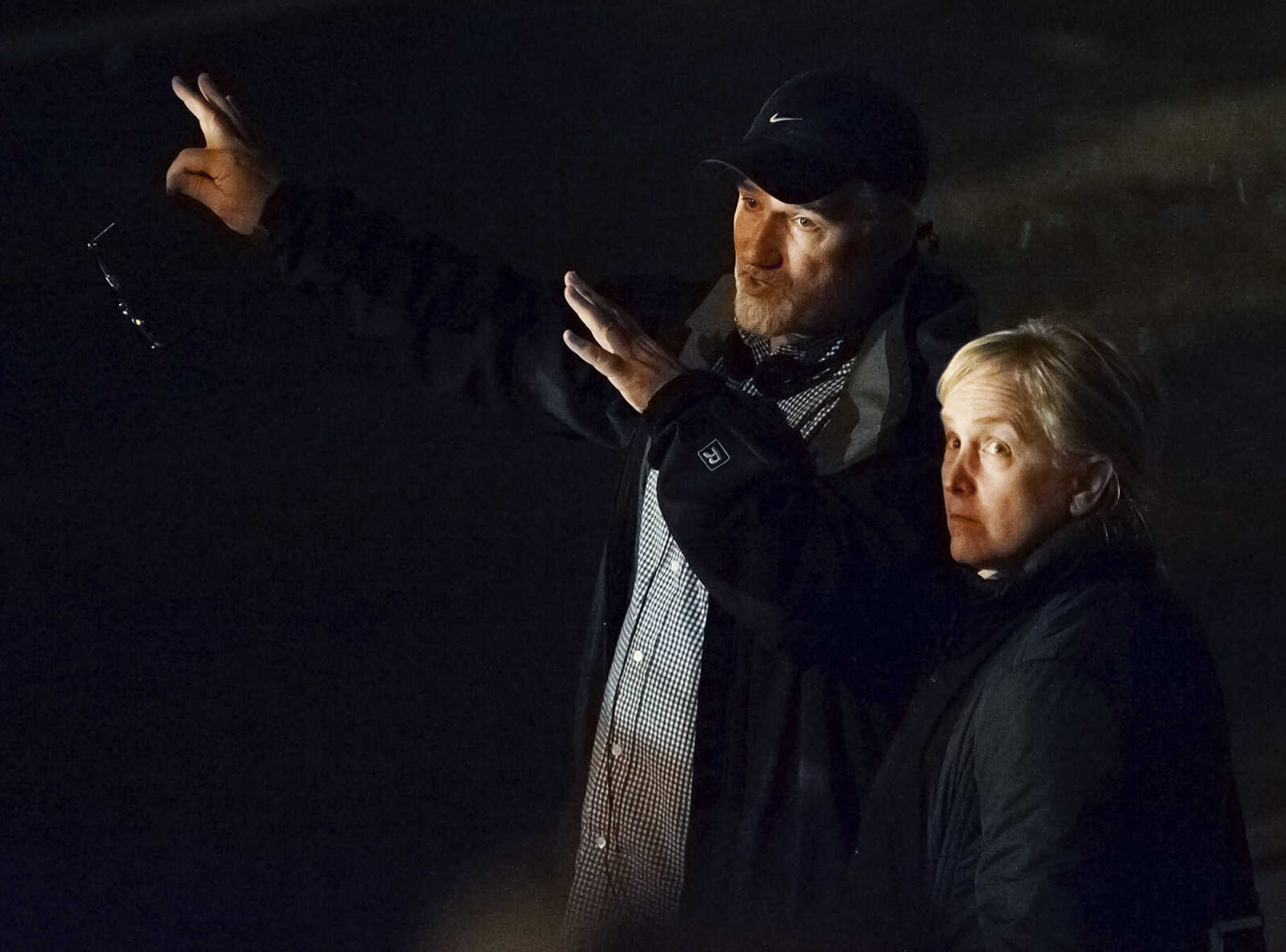 ADAM VOGLER ~ avogler@semissourian.com
Director David Fincher, left, speaks to a crew member while setting up to film a scene for the 20th Century Fox feature film "Gone Girl," Friday, Sept. 27, in downtown Cape Girardeau. Staring Ben Affleck and Rosamund Pike the film is expected to be filming in the Cape Girardeau area for several weeks.