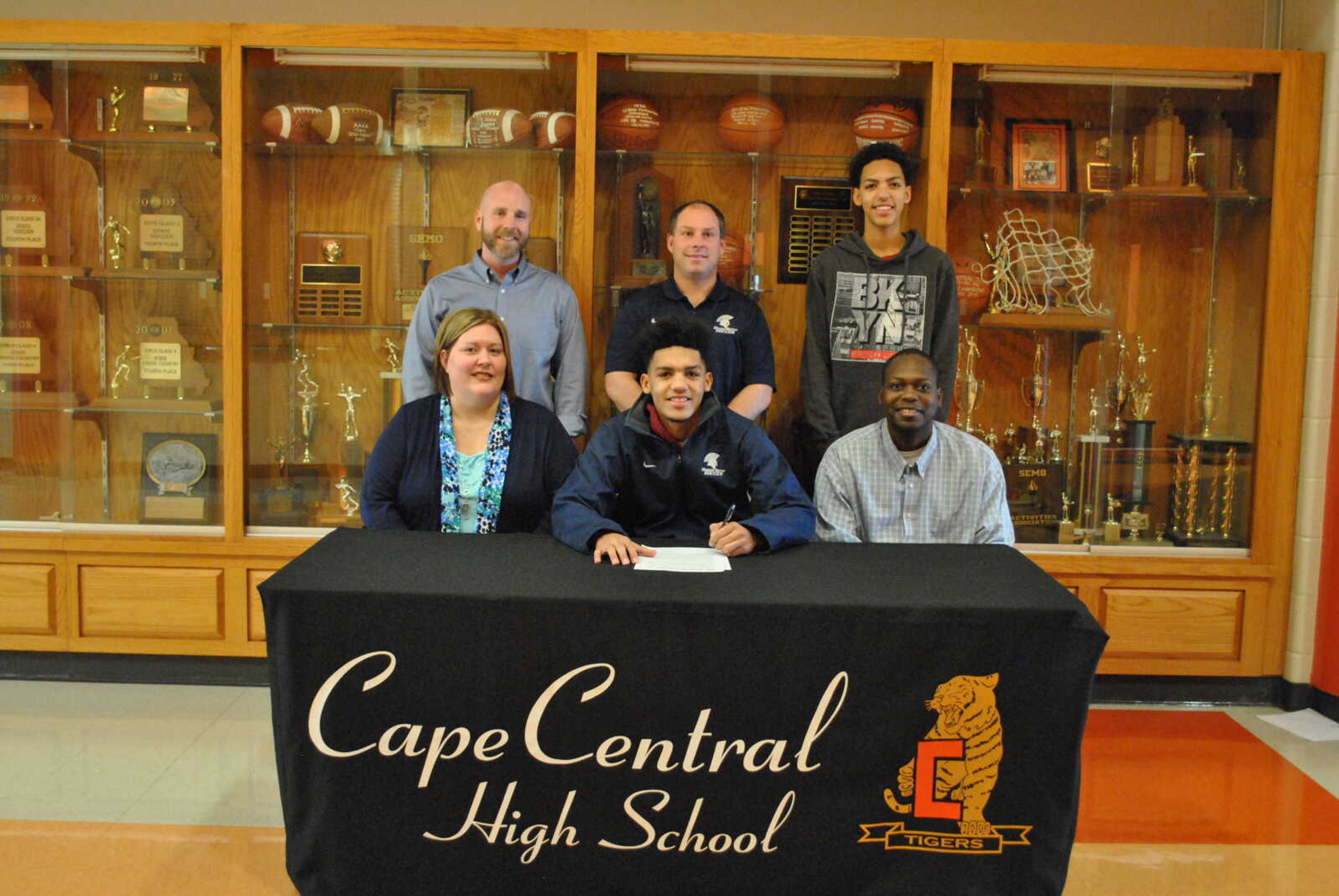 Pictured sitting with Dashuan are his parents, Tyoun and Stephanie Blissett.  Standing, left to right, are CHS soccer Coach Dan Martin, Missouri Baptist Coach Jacob Alvernia, and Dashuan’s brother, Trai Blissett.