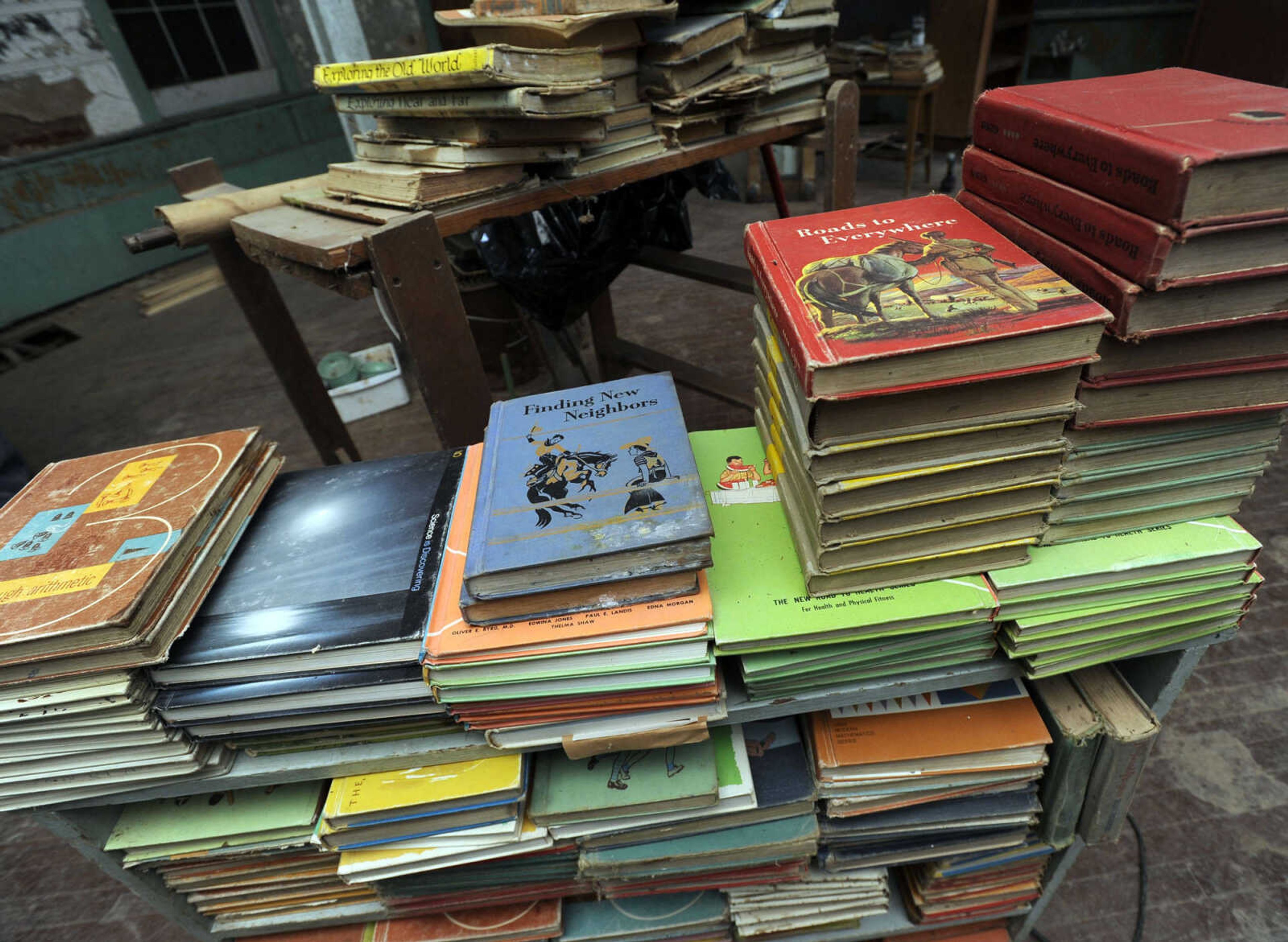 School books from school days at Kage School are seen Monday, March 24, 2014 in Cape Girardeau.