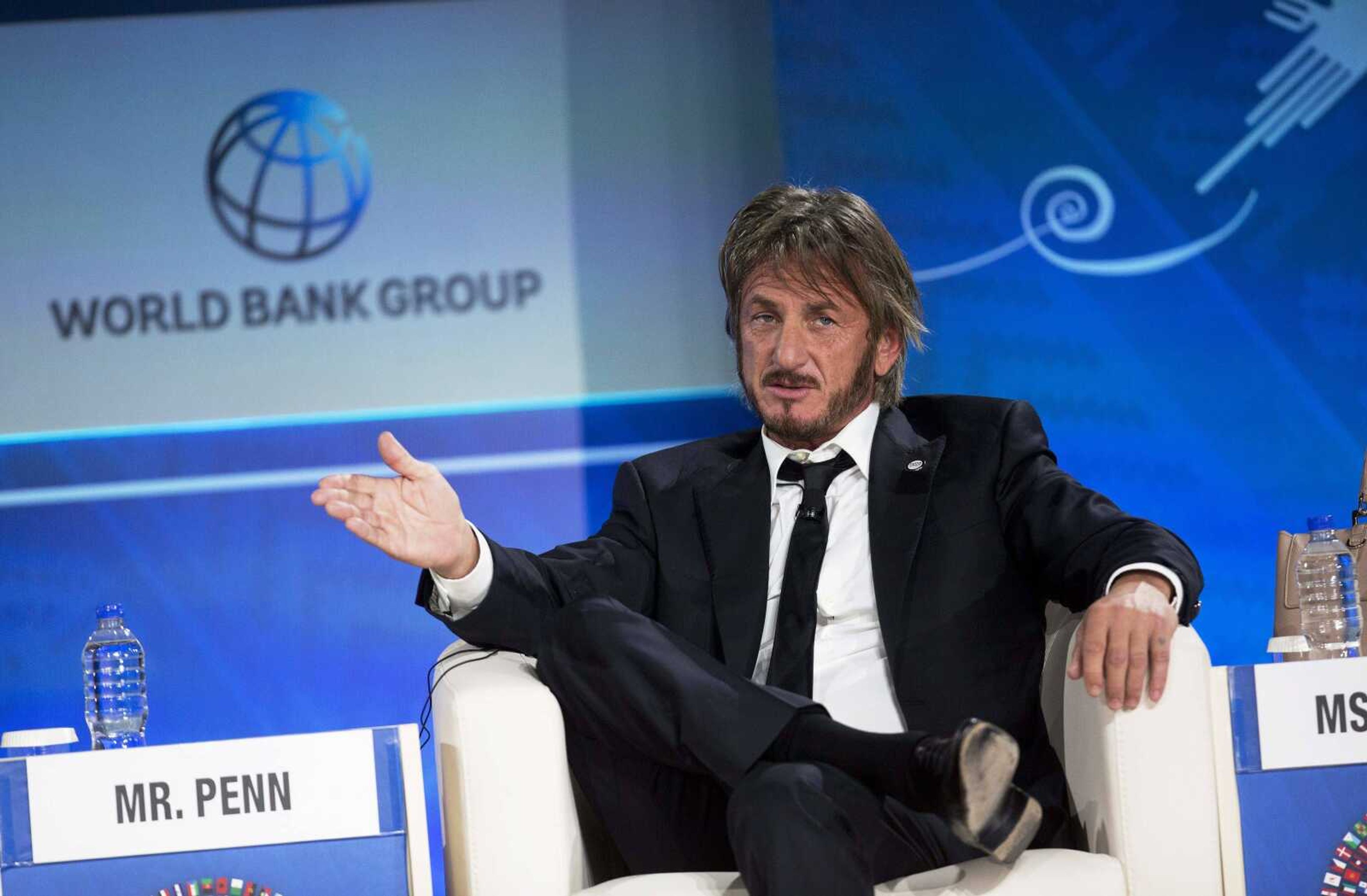 Sean Penn speaks during a forum Oct. 8 with young entrepreneurs during the IMF and World Bank annual meeting in Lima, Peru. Late Saturday, Rolling Stone magazine published an interview Guzman apparently gave to Penn in his hideout in Mexico months before his recapture. (Rodrigo Abd ~ Associated Press)