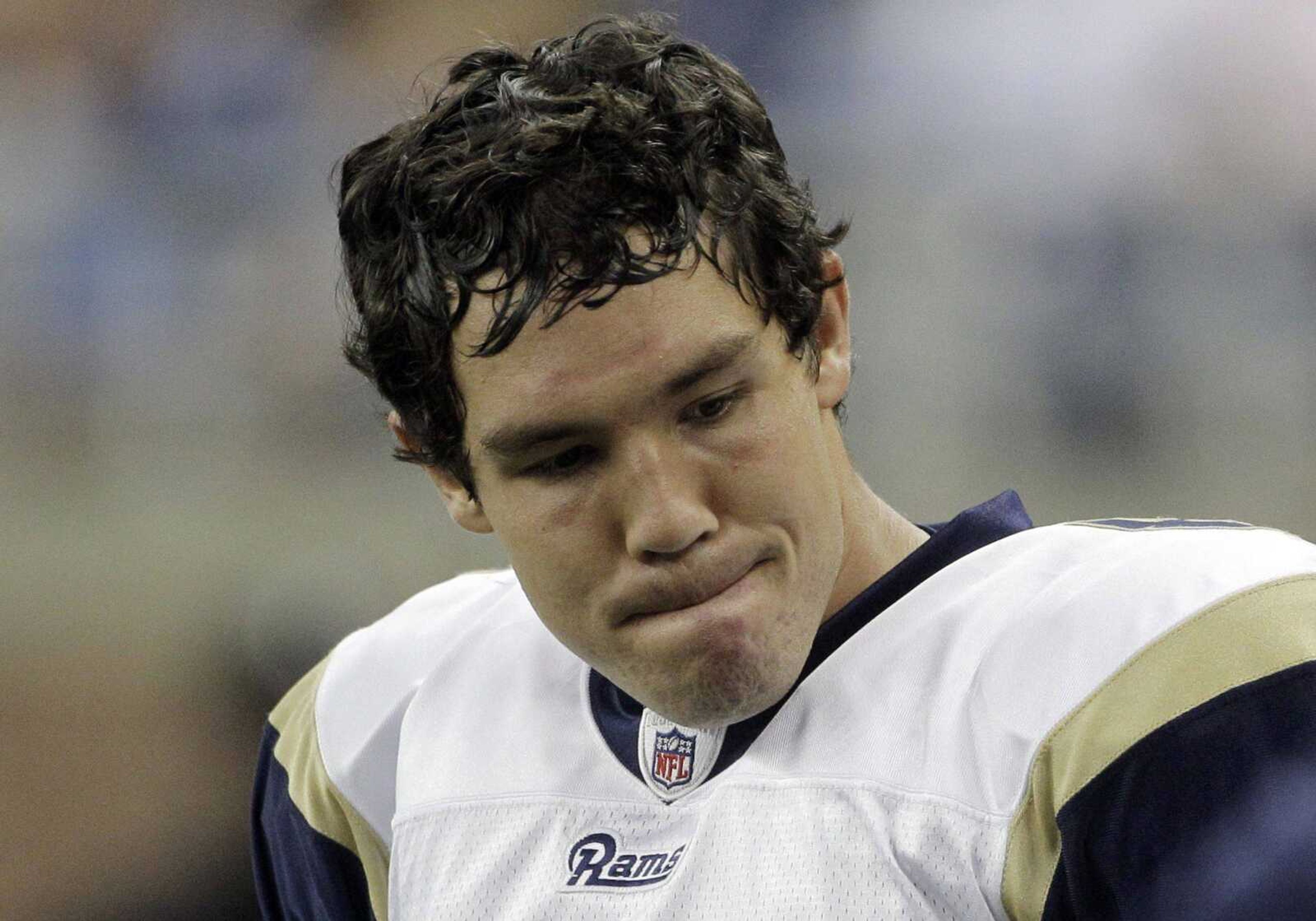 Rams quarterback Sam Bradford reacts after throwing an interception during Sunday's game in Detroit. (PAUL SANCYA ~ Associated Press)