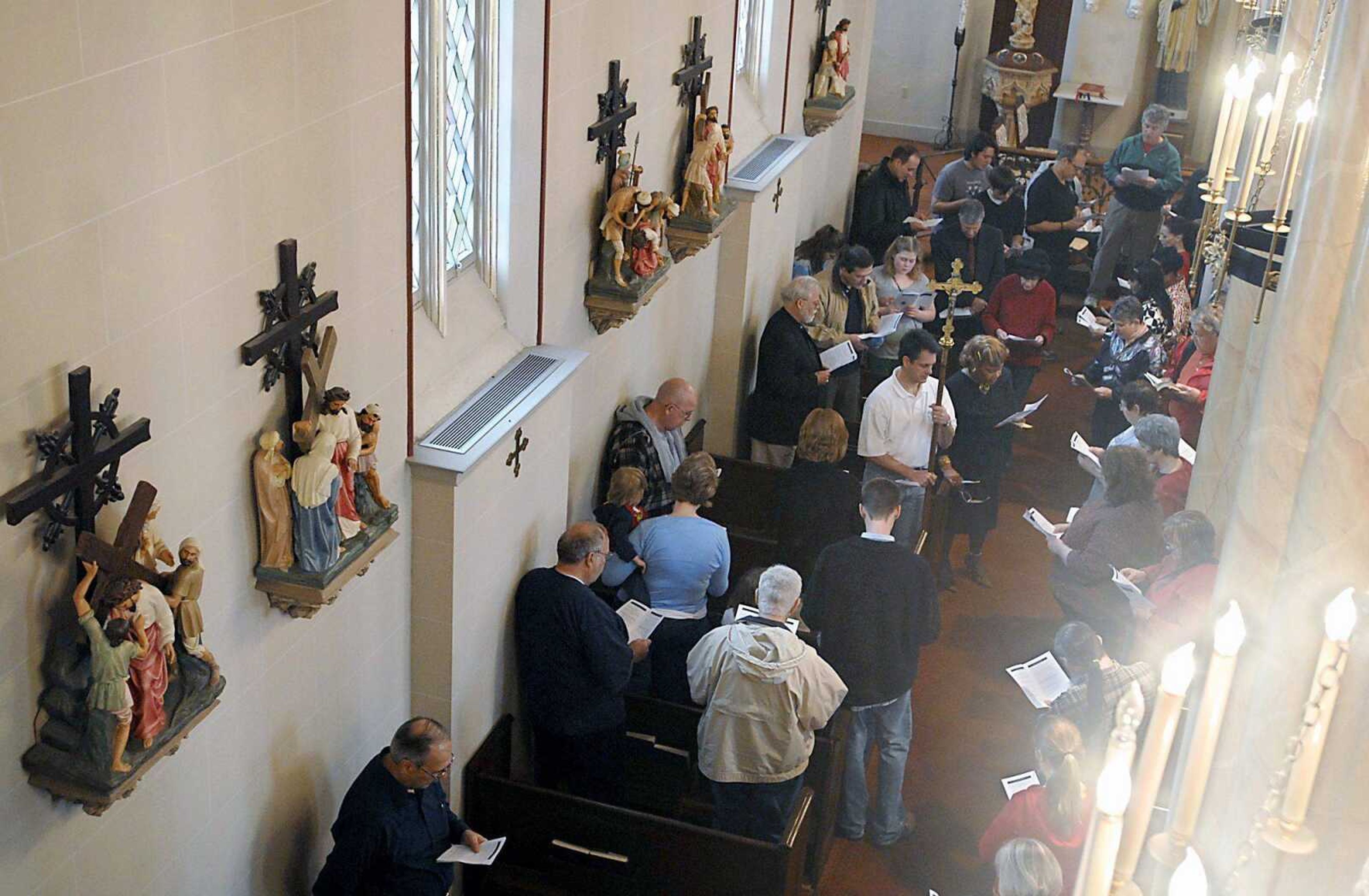 Weather brings Way of the Cross participants of many faiths into Old St. Vincent's Church