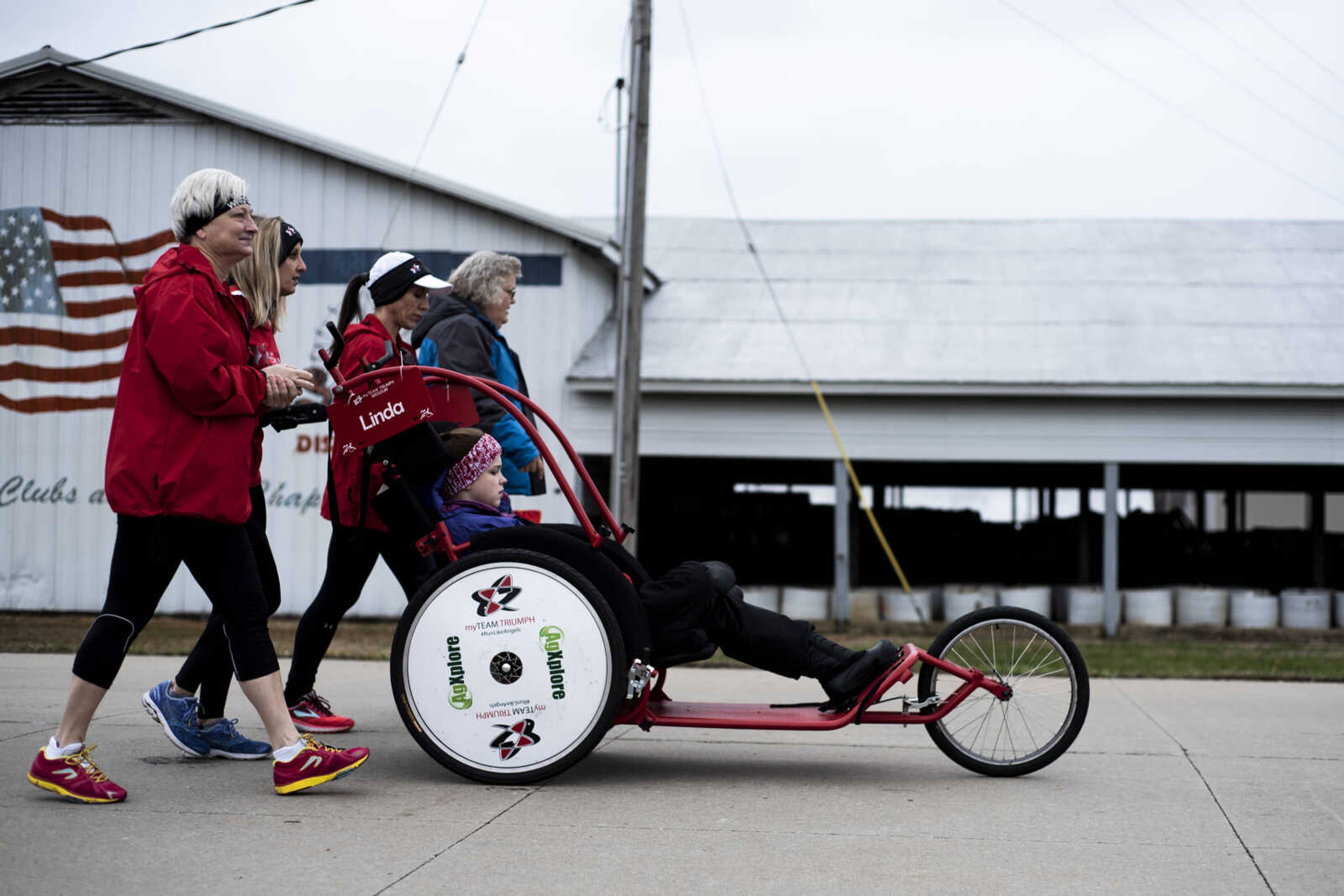 My Team Triumph volunteers and participants prepare for the Resolution Challenge through Arena Park Tuesday, Jan. 1, 2019, in Cape Girardeau.