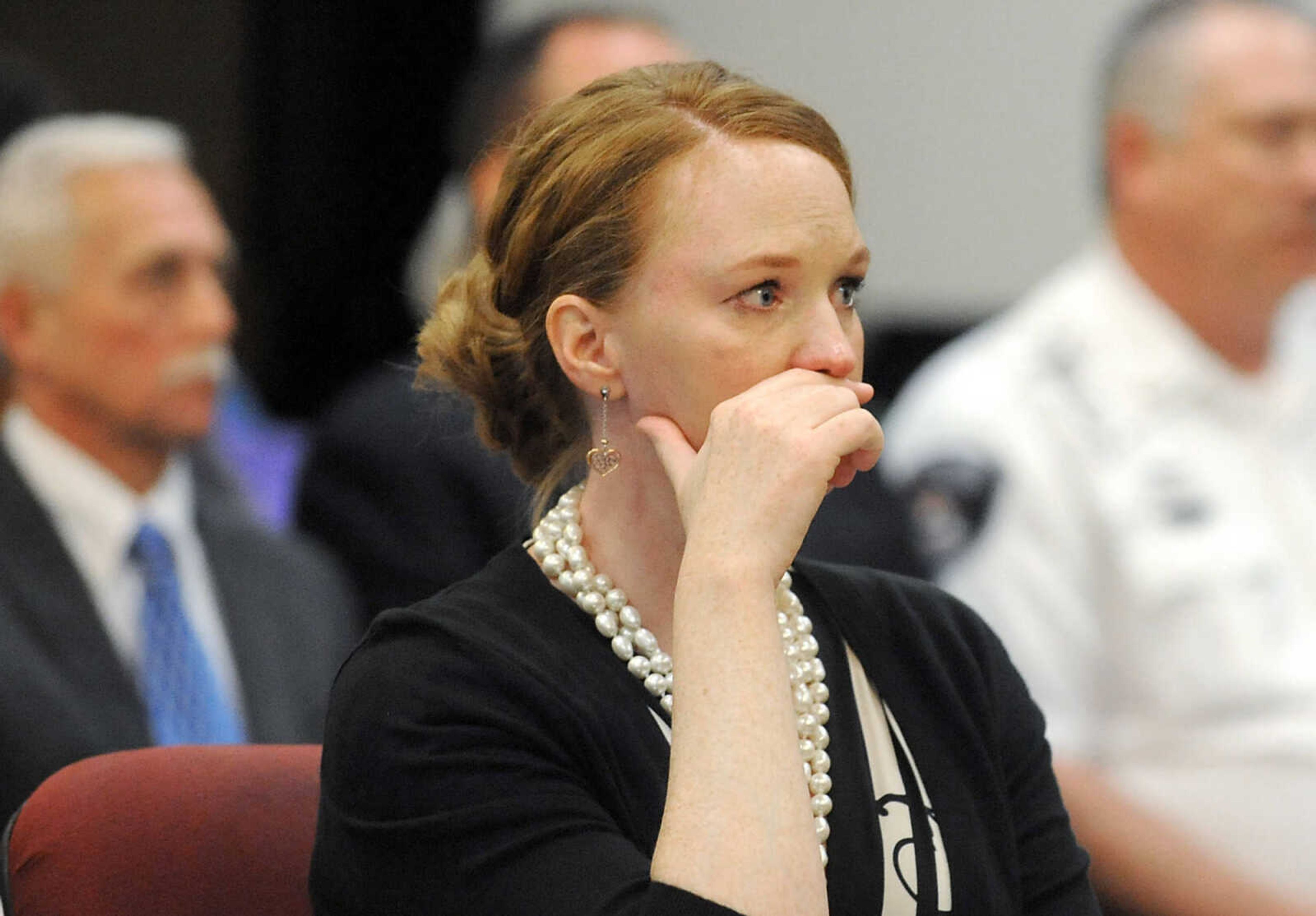 LAURA SIMON ~ lsimon@semissourian.com 
Public defender Amy Commean reacts as Cheryl Brenneke gives her victim impact statement, Thursday, June 6, 2013, at the Cape Girardeau County Courthouse. Clay Waller pleaded guilty to second-degree murder for the death of Brenneke's sister, Jacque Waller. Jacque Waller went missing June 1, 2011. Her body was found last Wednesday in Southern Illinois.