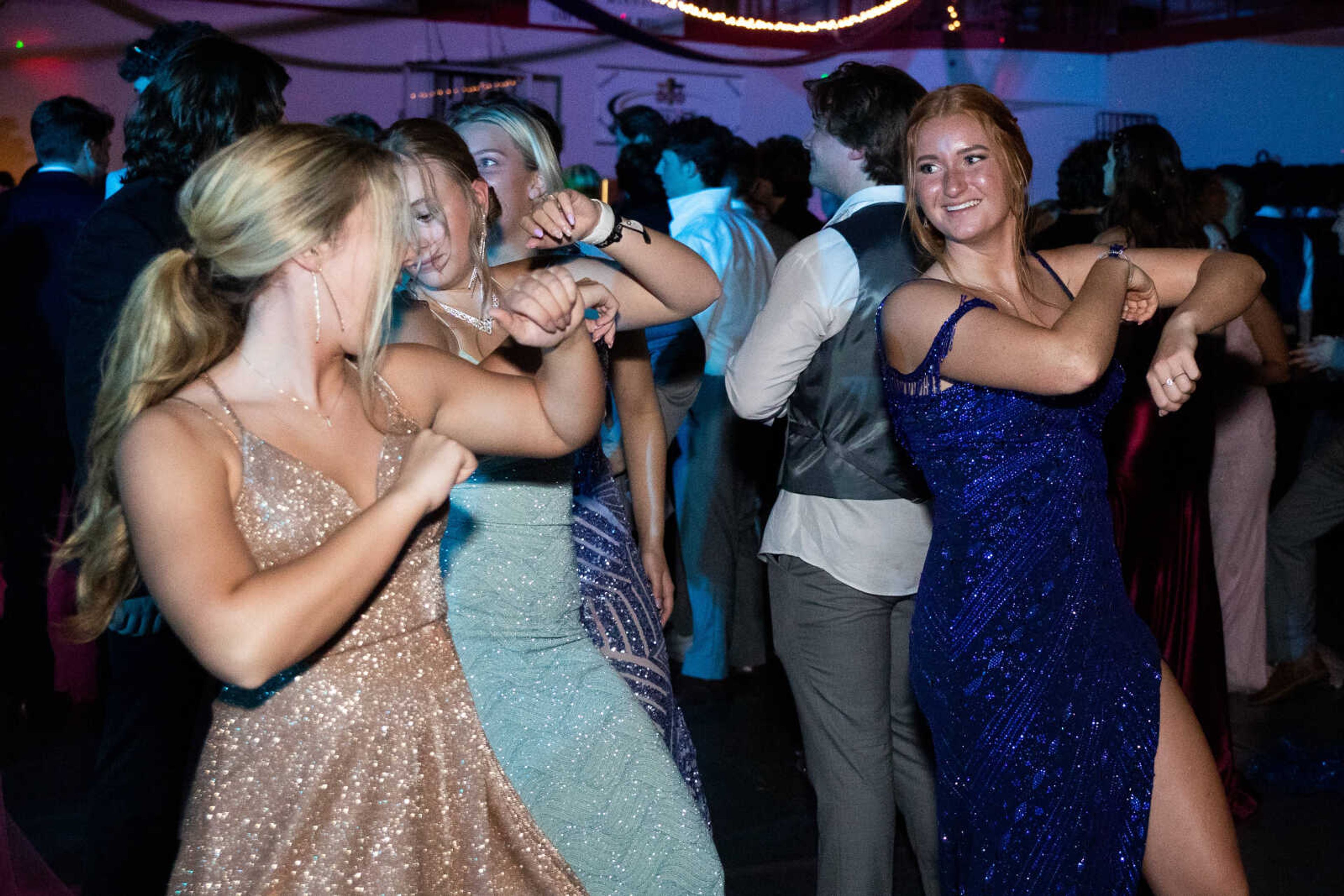 Lillian Gibbs dances with her friends at prom on Saturday, May 6 at Jackson High School.