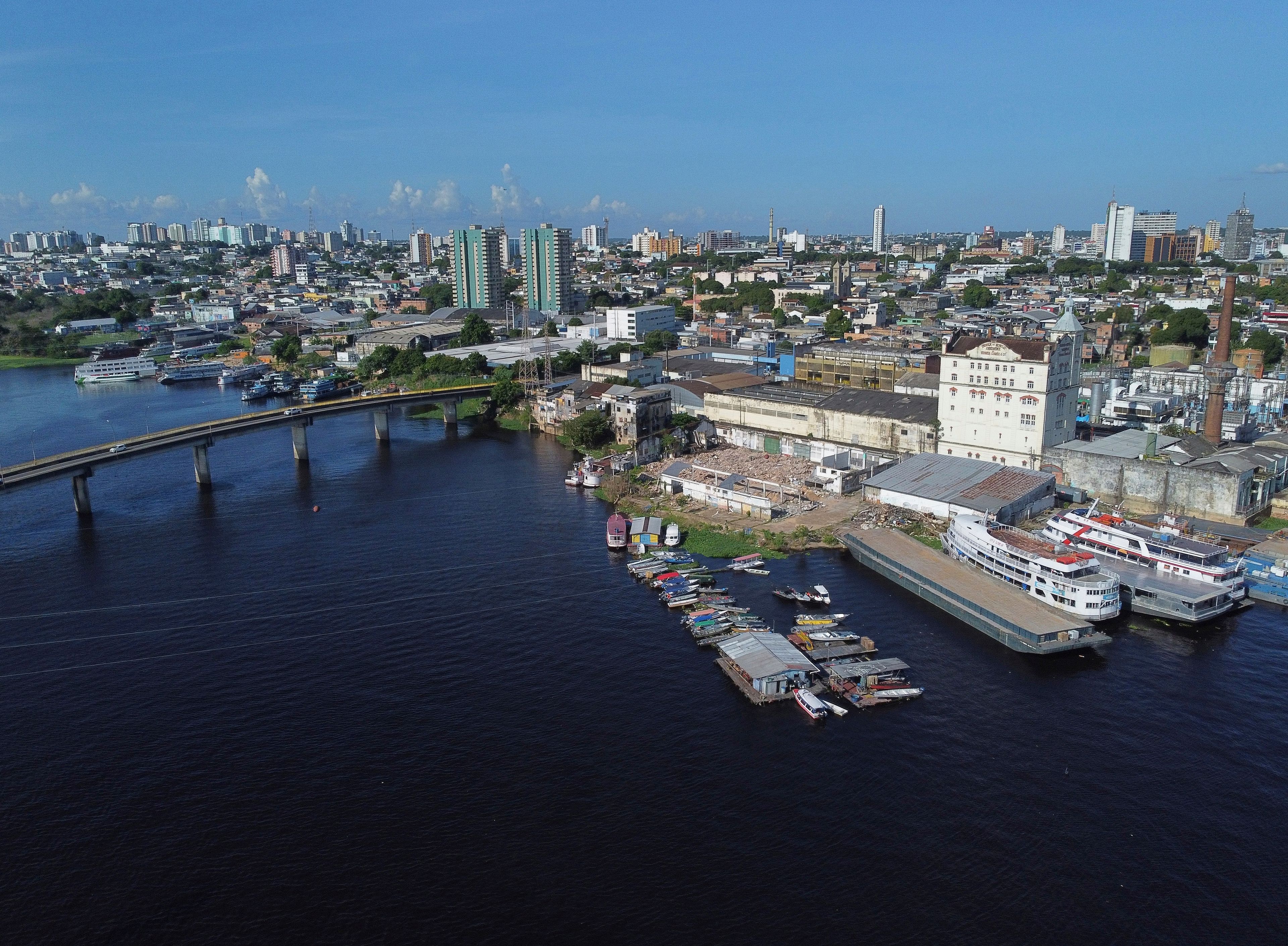 Part of the Sao Raimundo that connects to the Negro River is visible in Manaus, state of Amazonas, Brazil, Thursday, June 20, 2024. (AP Photo/Edmar Barros)