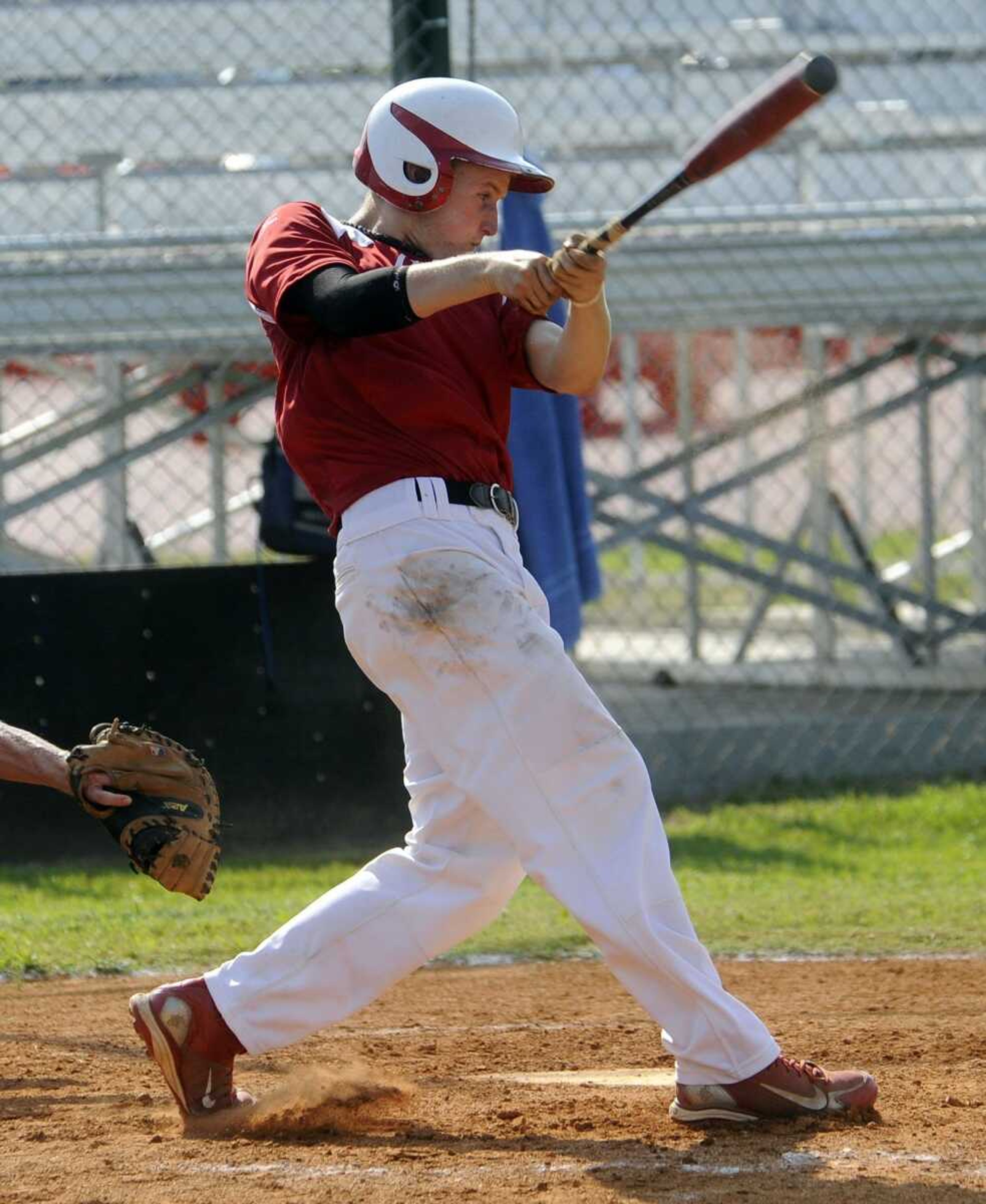 Chaffee's Daniel Dooley singles against Iowa during the third inning in the Midwest Plains Regional Baseball Tournament Saturday, July 23, 2011 in Charleston, Mo. (Fred Lynch)