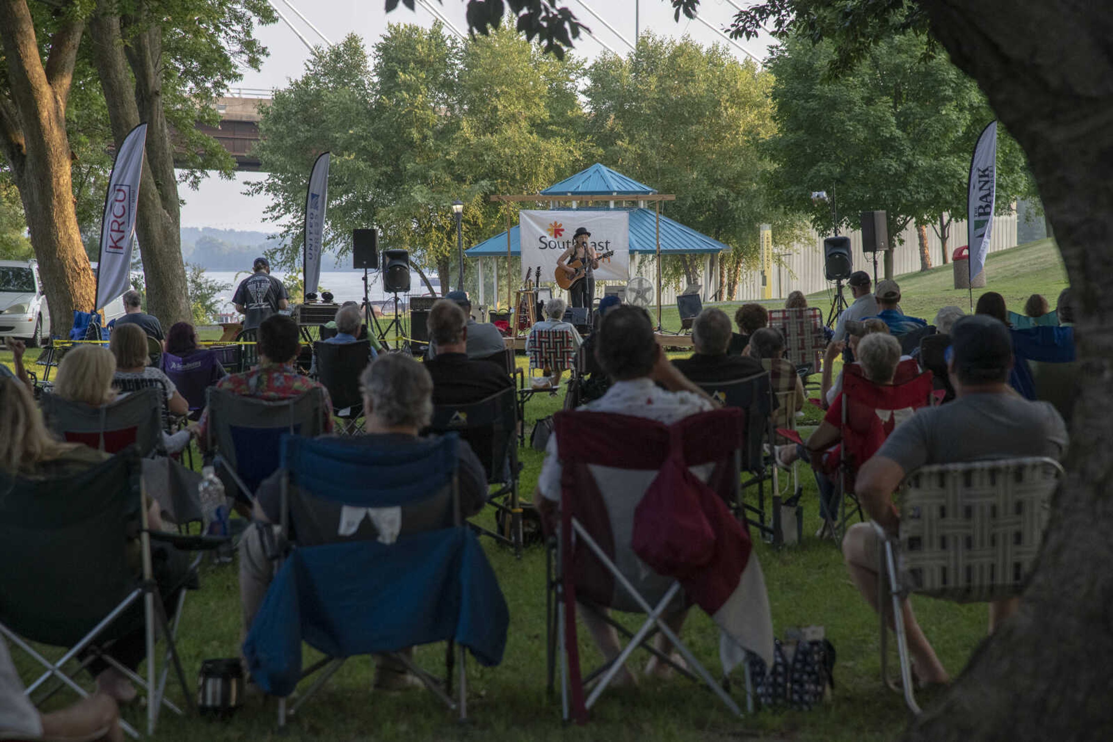 The audience watches as Anne McCue performs during Tunes at Twilight at the River Campus Friday Aug. 6, 2021.