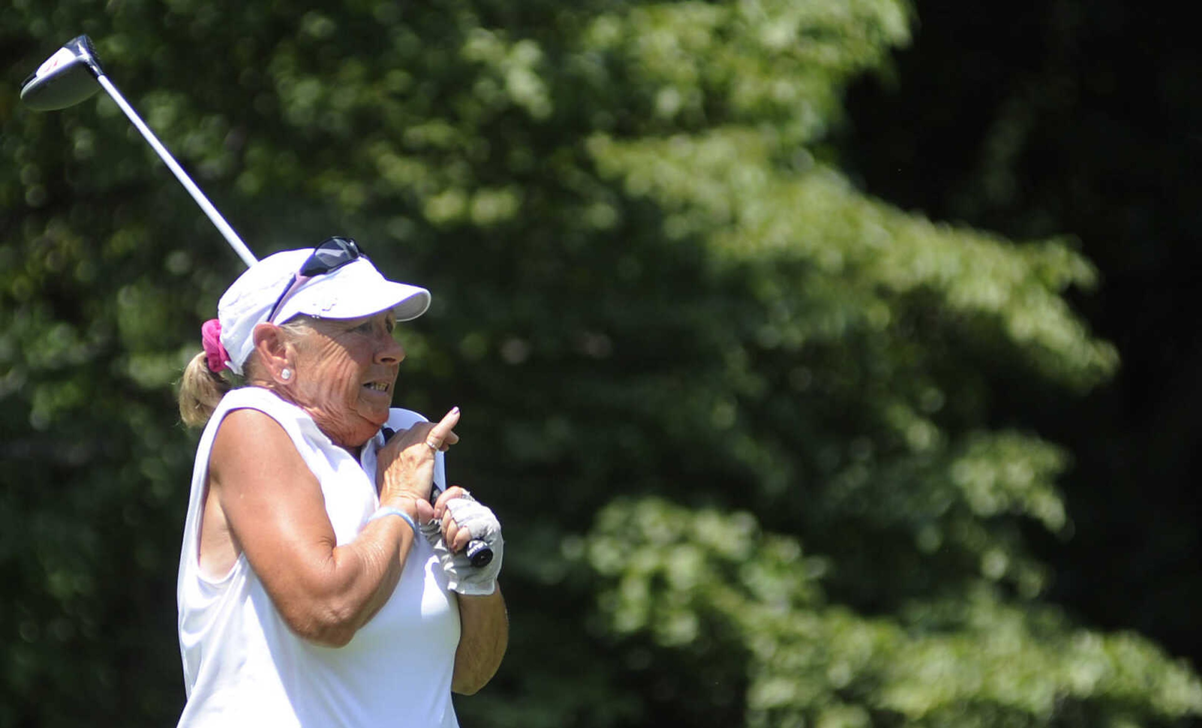 ADAM VOGLER ~ avogler@semissourian.com
Tammy Kulage reacts to her drive during the Lassie's Classic golf tournament Wednesday, July 17, at Cape Girardeau Country Club.