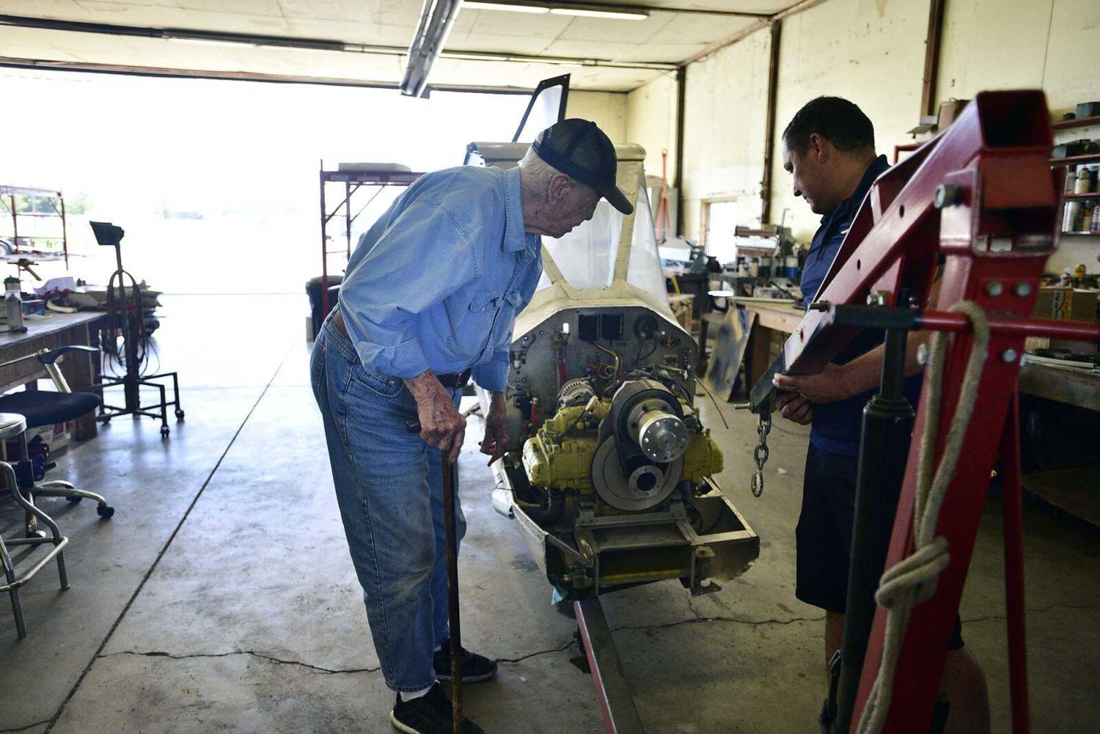 Cutline-Body Copy:John Farquhar, known to many as "Papa John," spends most of his days tinkering inside the hangar that houses Cape Copters at the Cape Girardeau Regional          Airport.