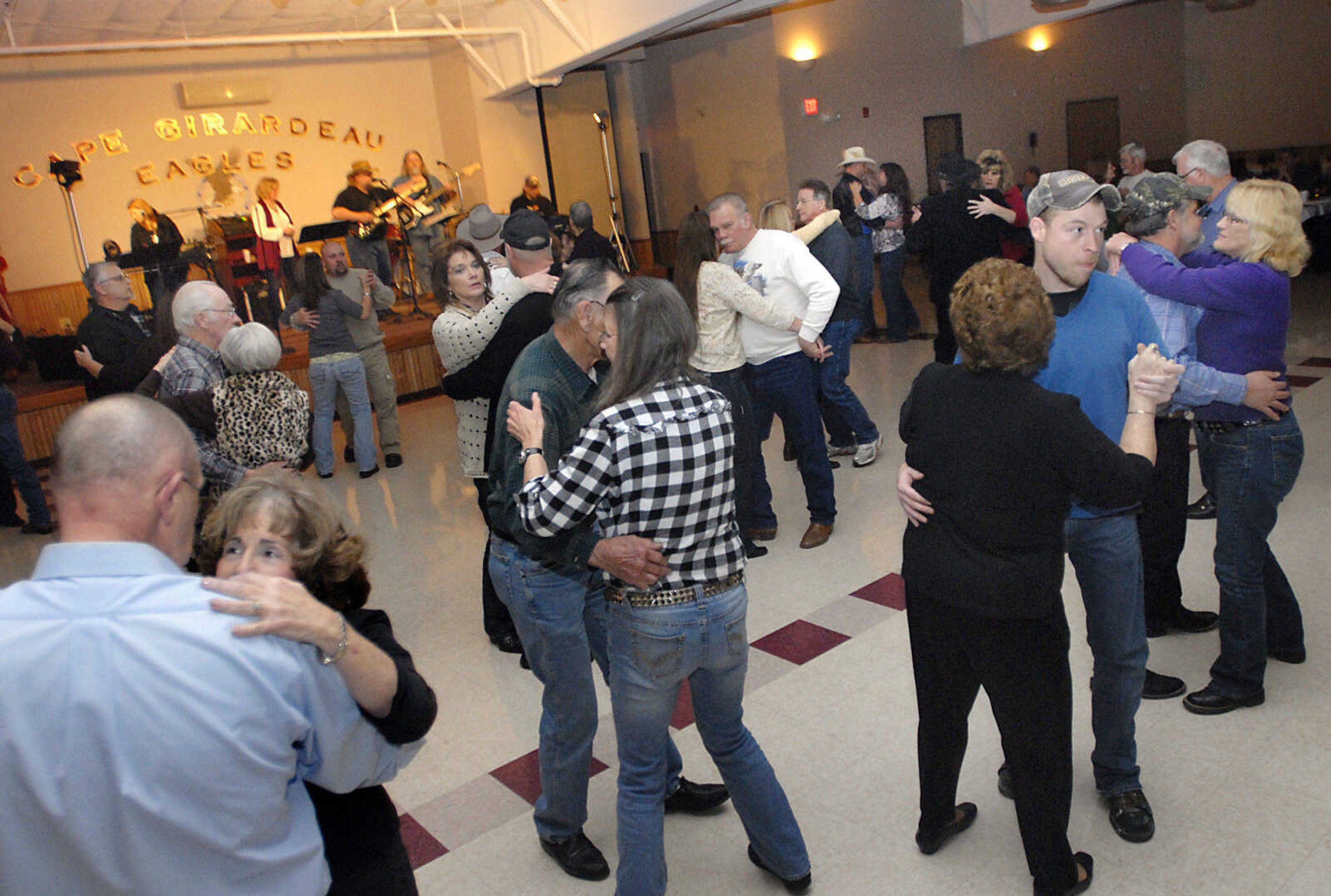 KRISTIN EBERTS ~ keberts@semissourian.com

Couples dance to the music of Bill Hulvey & Side Street Band with special guest Susan Anderson Bell during the Cape Eagles #3775 Valentine Dance on Saturday, Feb. 11, 2012. Proceeds from the event benefit the Dream Factory charity.