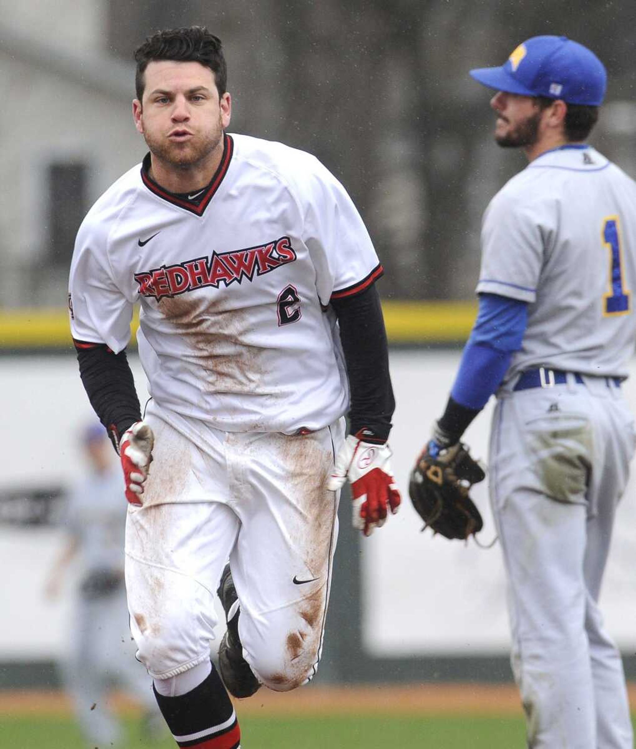 Southeast Missouri State's Chris Caffrey heads to third base on a failed pickoff attempt at second by the Morehead State pitcher during the second inning Sunday, March 20, 2016 at Capaha Field.