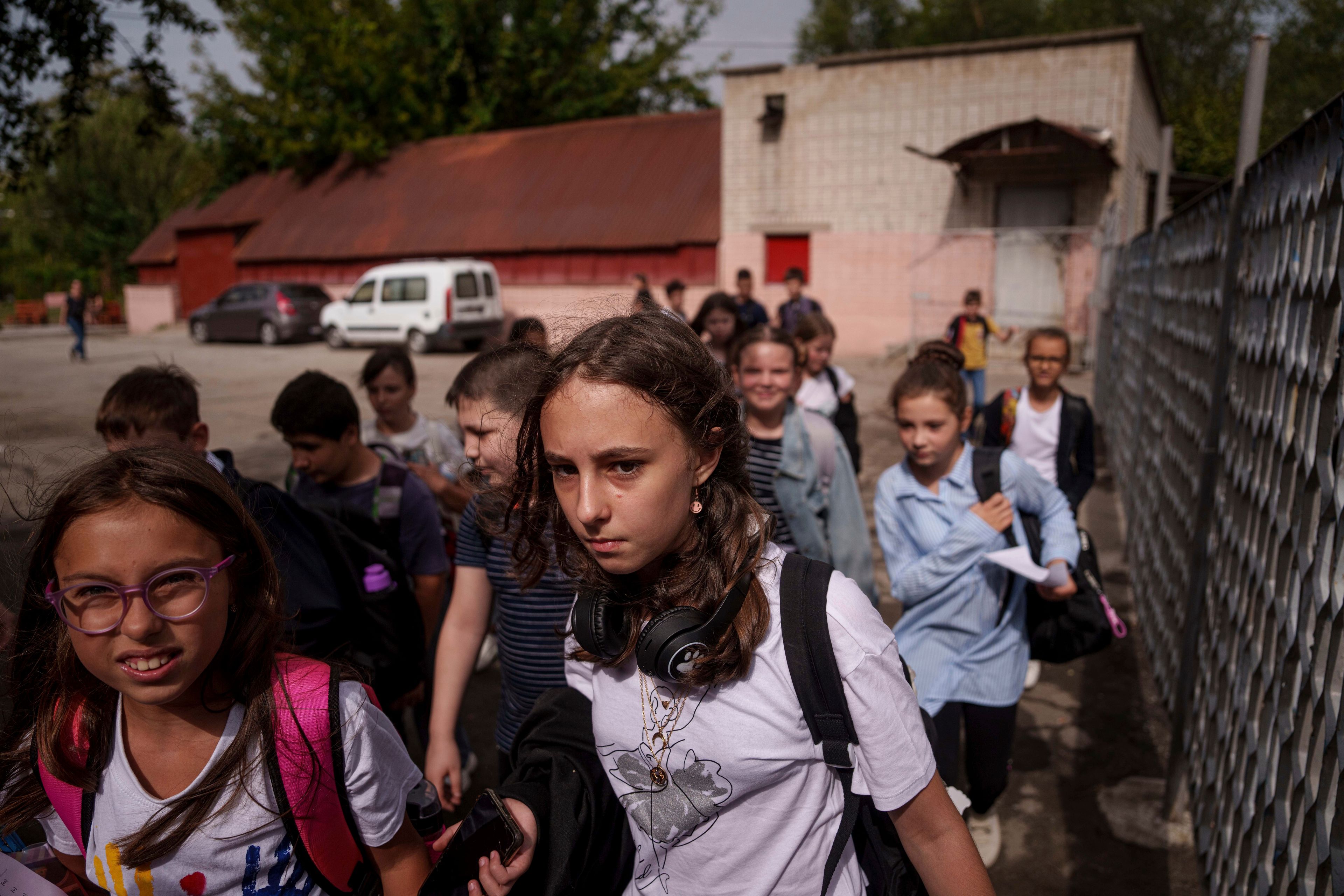 Children go to the school basement to continue their studies during an air alert in Zaporizhzhia, Ukraine, Sept. 3, 2024. (AP Photo/Evgeniy Maloletka)