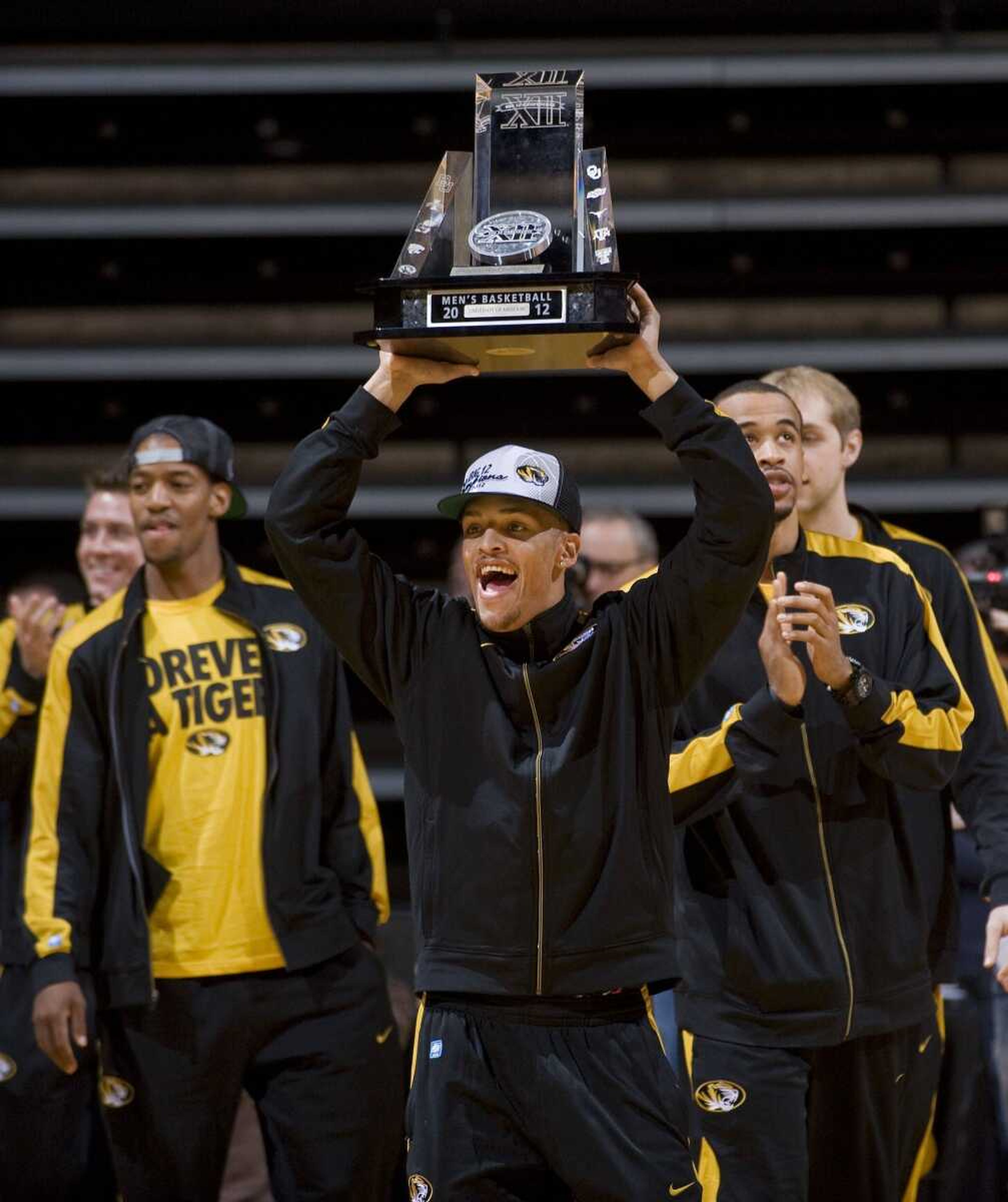 Missouri&#8217;s Michael Dixon carries the Big 12 tournament championship trophy into Mizzou Arena before the start of their NCAA tournament selection party Sunday in Columbia, Mo. Missouri was given the No. 2 seed in the West Regional.<br><b>L.G. Patterson<br></b>Associated Press