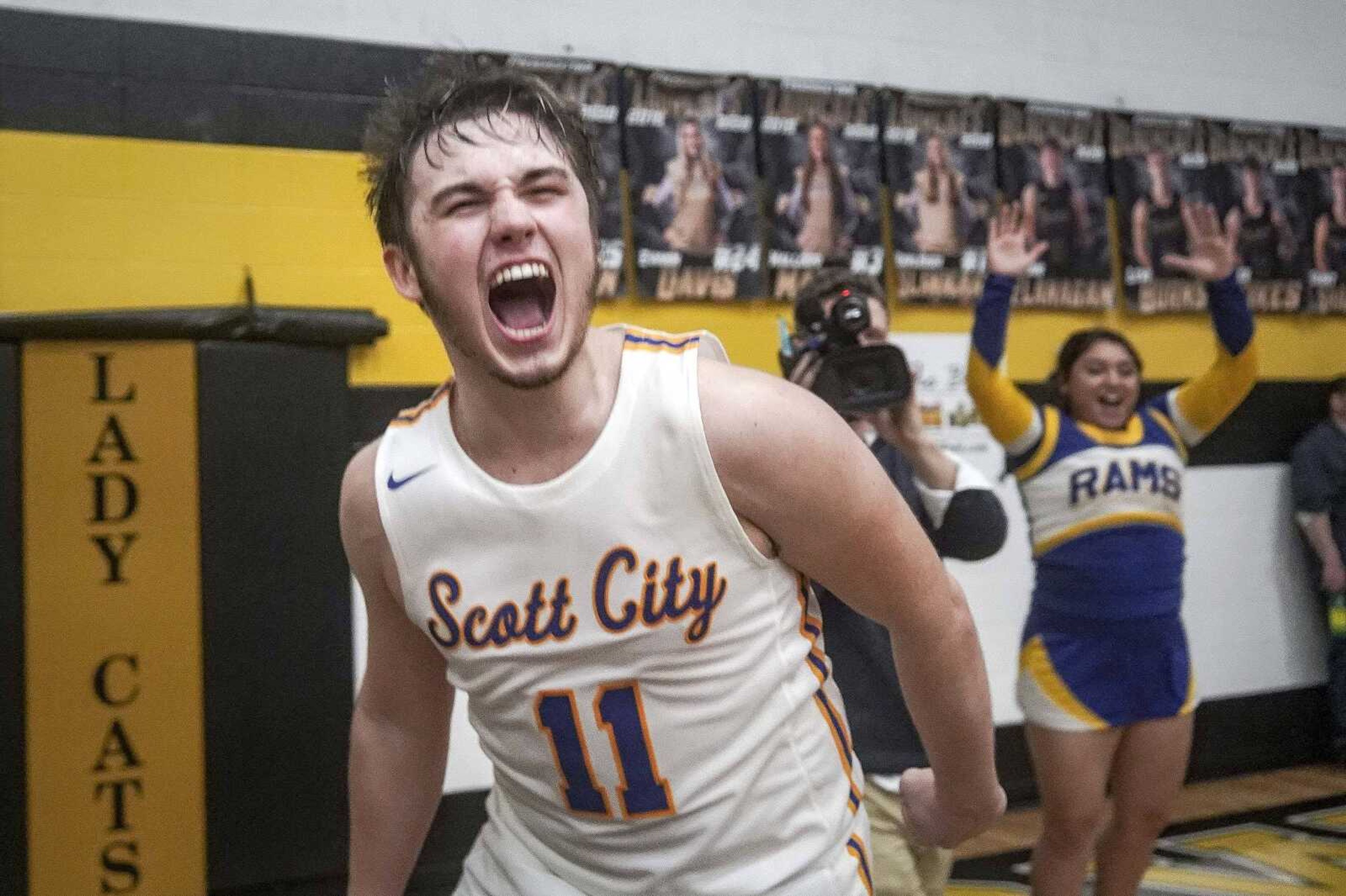 Scott City's Spencer Stratman roars after the Rams won the  Class 3, District 2 championship game over Kelly Friday, Feb. 28, 2020, at Fredericktown High School in Fredericktown. Stratman played a pivotal role in the Rams' win, in part due to several key three-point shots.