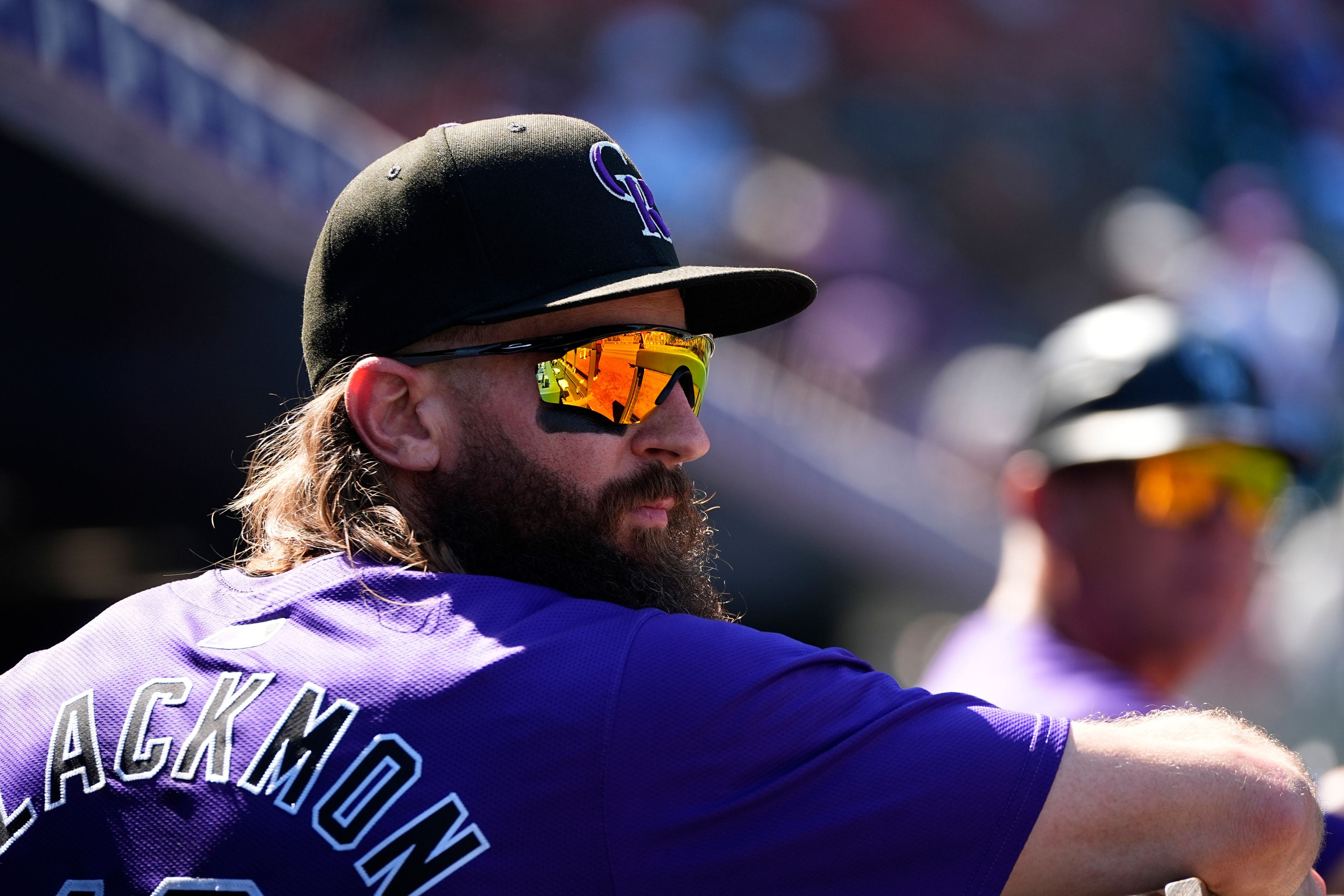 Colorado Rockies' Charlie Blackmon, who is retiring at season's end, looks on in first inning of a baseball game against the St. Louis Cardinals Thursday, Sept. 26, 2024, in Denver. (AP Photo/David Zalubowski)