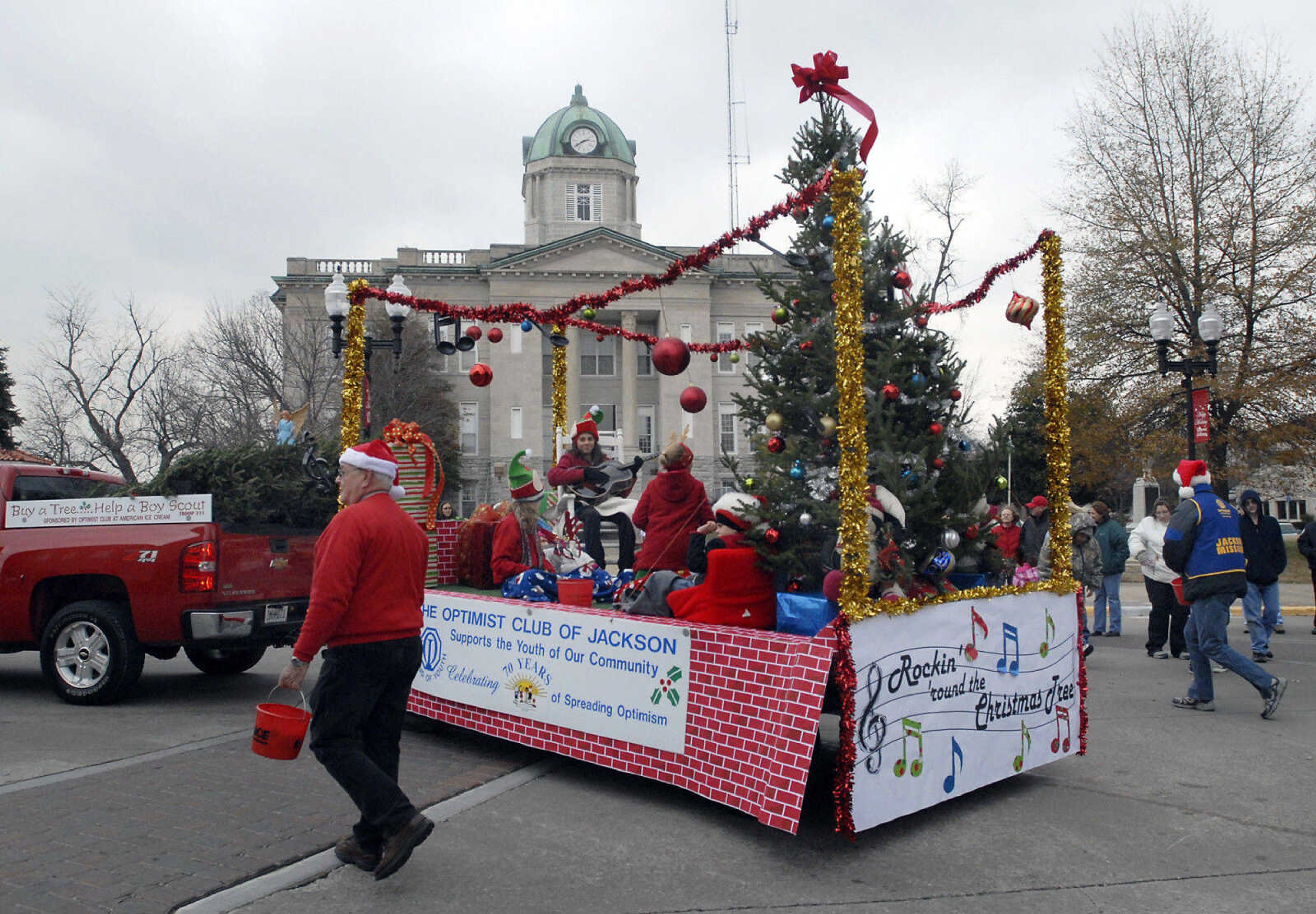 KRISTIN EBERTS ~ keberts@semissourian.com

The Optimist Club of Jackson's float passes the courthouse during the Jackson Christmas Parade on Saturday, Dec. 4, 2010, in downtown Jackson.