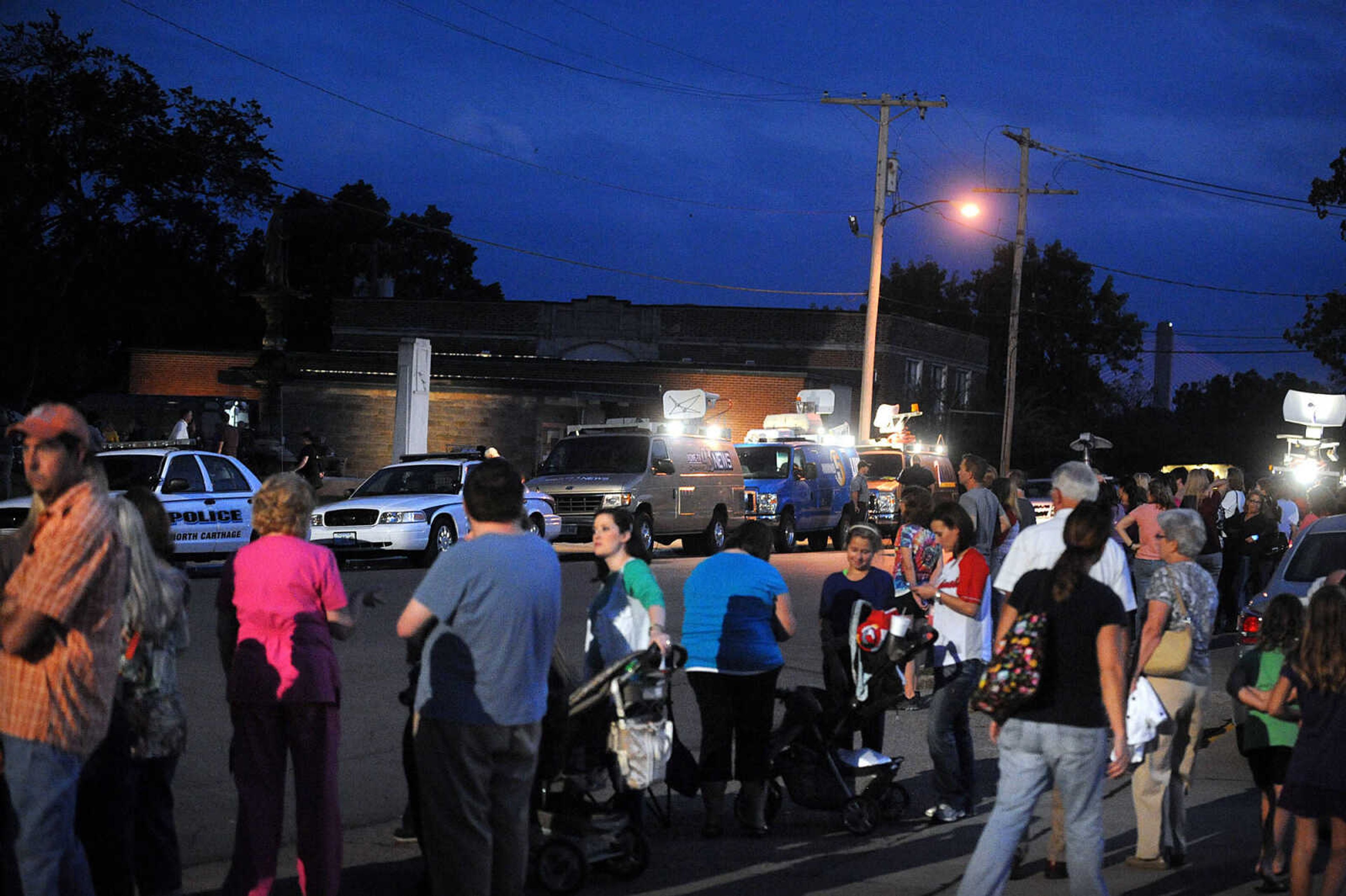 LAURA SIMON ~ lsimon@semissourian.com

Onlookers line Lorimier Street as filming for 20th Century Fox's feature film "Gone Girl" gets underway at the Common Pleas Courthouse, Thursday, Oct. 3, 2013, in Cape Girardeau.