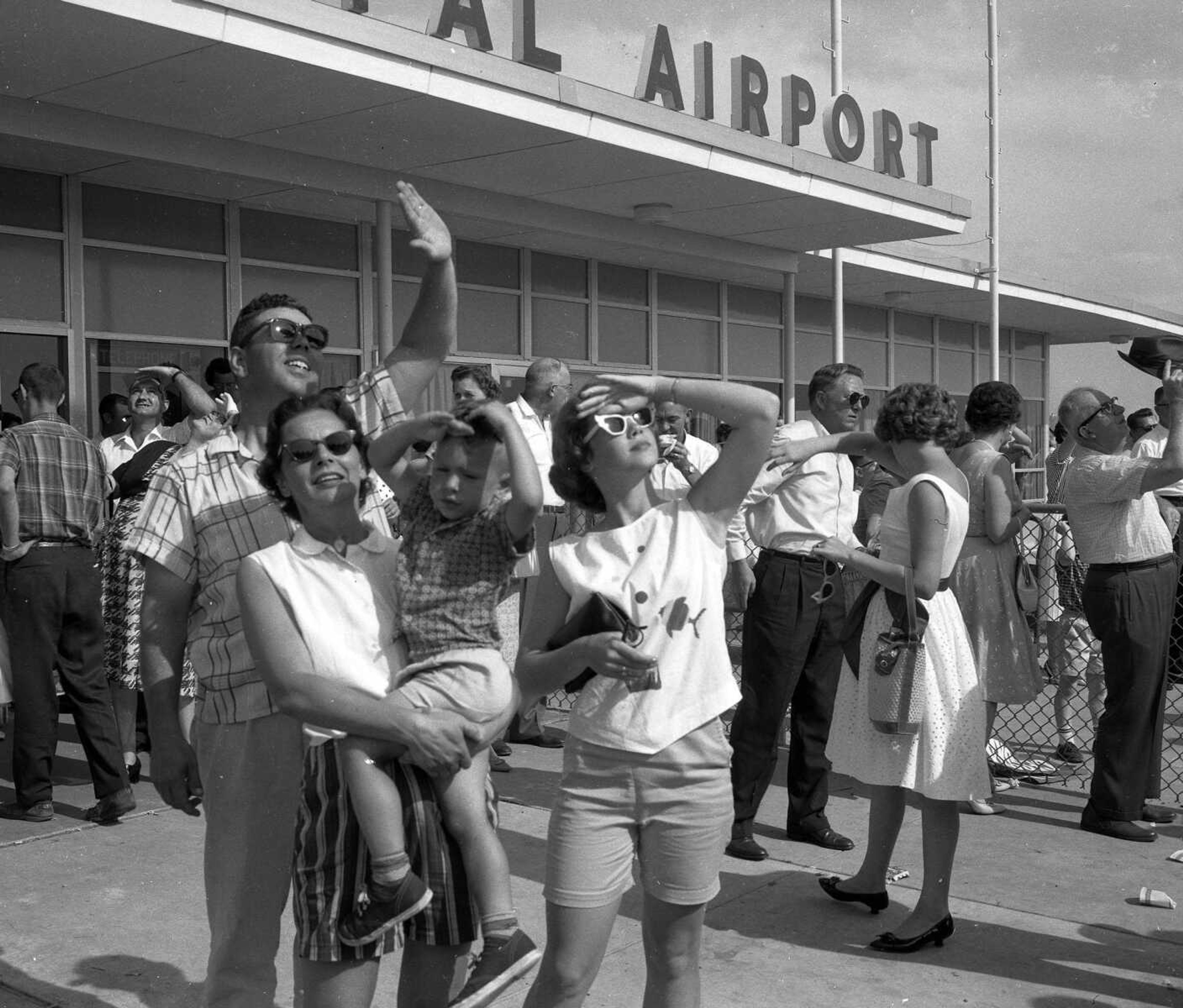 This photo was made at Aviation Day at the Cape Girardeau Municipal Airport in 1961. Karen Campbell-Schmidt spotted her family in the photo: "What a nice surprise to see my family in the paper!! The photo is of my mother Betty Jo Campbell holding my brother George Campbell Jr. To their left is my sister Rebecca Campbell Everly. We cannot quite decide if that is dad standing behind them or not. At the time (about 1960??) my brother would have been about 3. We lived in Chaffee. Our family moved away in 1965, when there was much reorganization of the Frisco (now Burlington Northern) Railroad. Both of our parents have since passed away after returning to live in Cape after retirement in the mid-1980s. My brother is a very successful motivational speaker and screen writer. Our sister is a retired elementary school teacher. I am not in this picture but I do remember attending this event. I briefly retired from a 37-year career as an RN in Tulsa, Okla., and decided to move back to Cape. After a few months of retirement in Cape I returned to a great RN position."