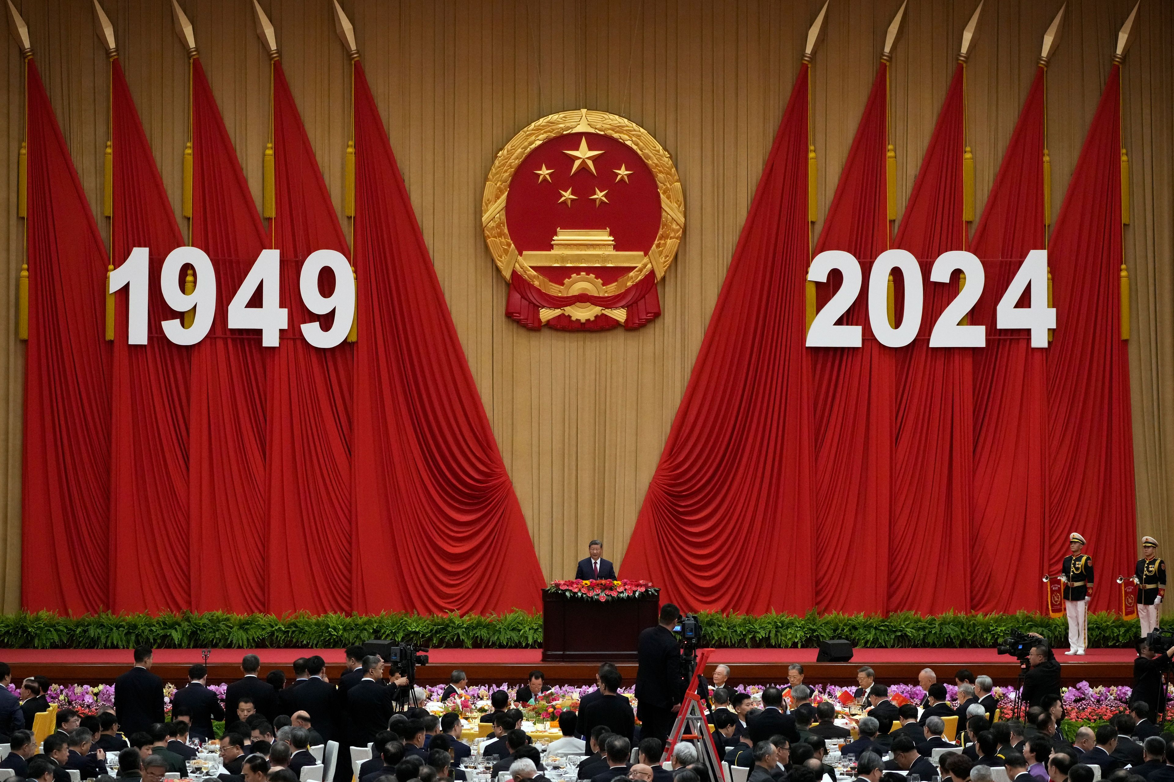 Chinese President Xi Jinping delivers his speech at a dinner marking the 75th anniversary of the founding of the People's Republic of China, at the Great Hall of the People in Beijing, Monday, Sept. 30, 2024. (AP Photo/Andy Wong)