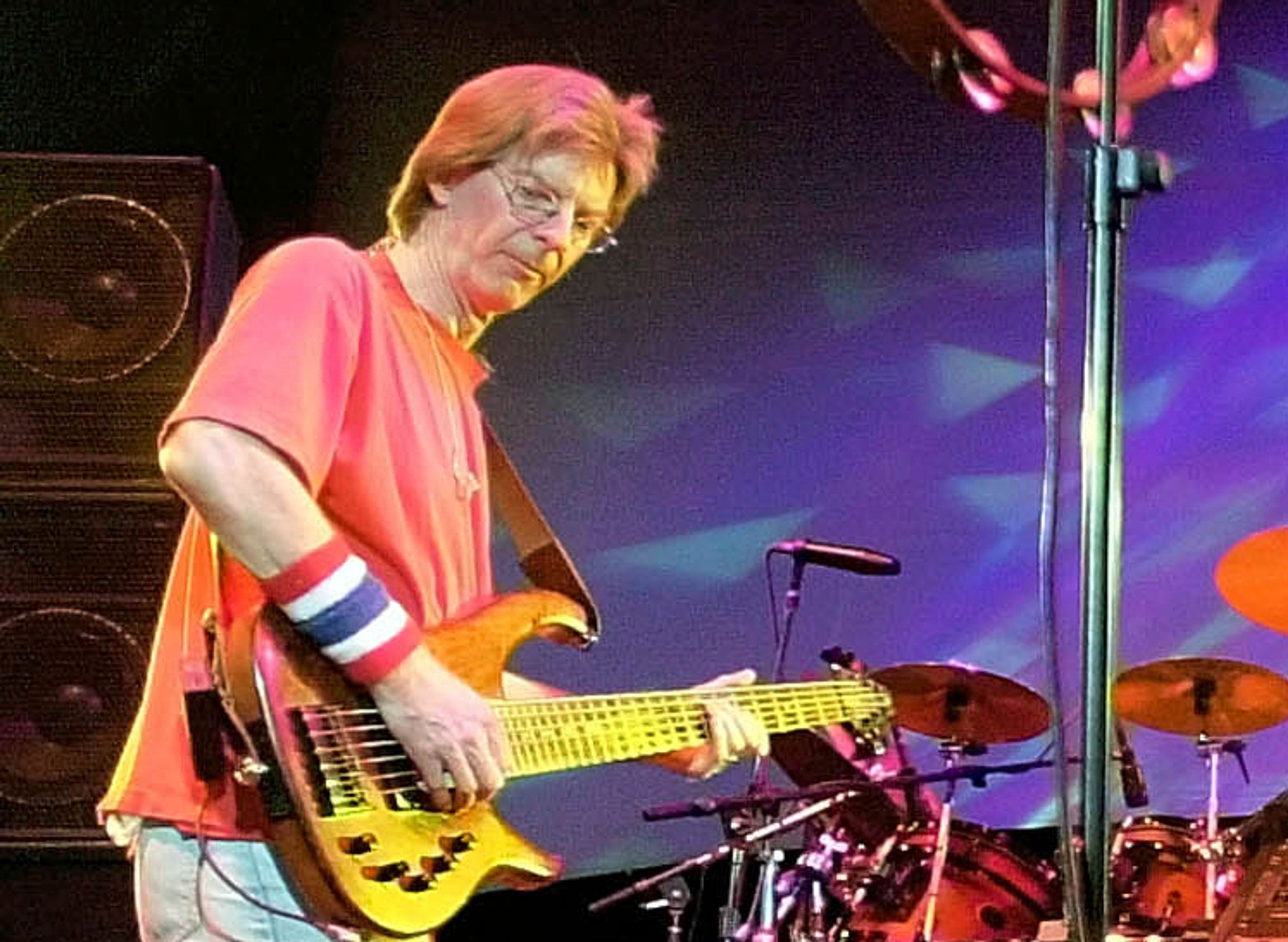 FILE - Phil Lesh, of The Grateful Dead, performs during a reunion concert in East Troy, Wis. on Aug. 3, 2002. Lesh, a founding member of the Grateful Dead, died Friday, Oct. 25, 2024, at age 84. (AP Photo/Morry Gash, File)