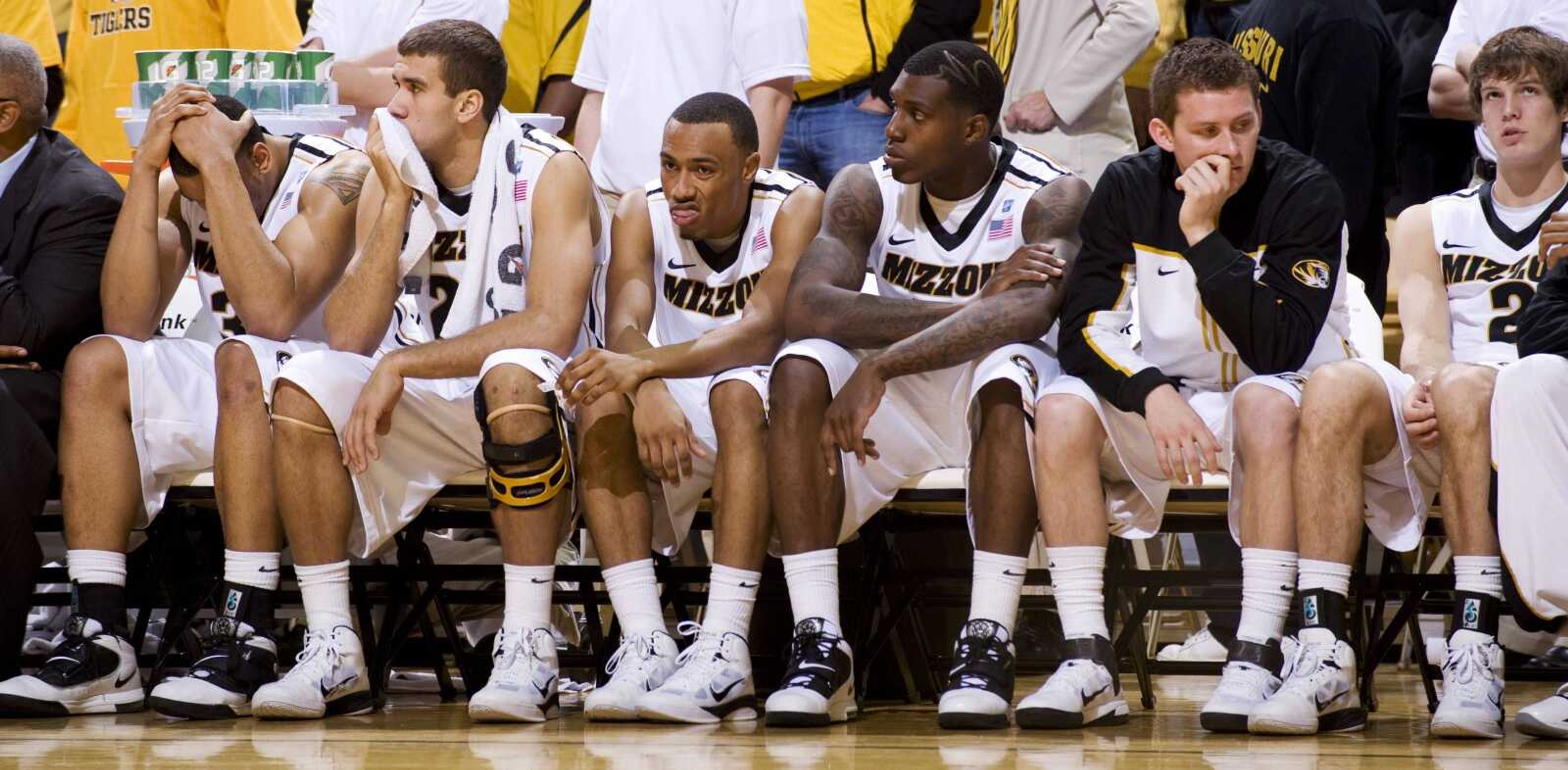 The Missouri bench sits dejected during the final minute of their 70-66 loss to Kansas on Saturday in Columbia, Mo. (L.G. PATTERSON ~ Associated Press)