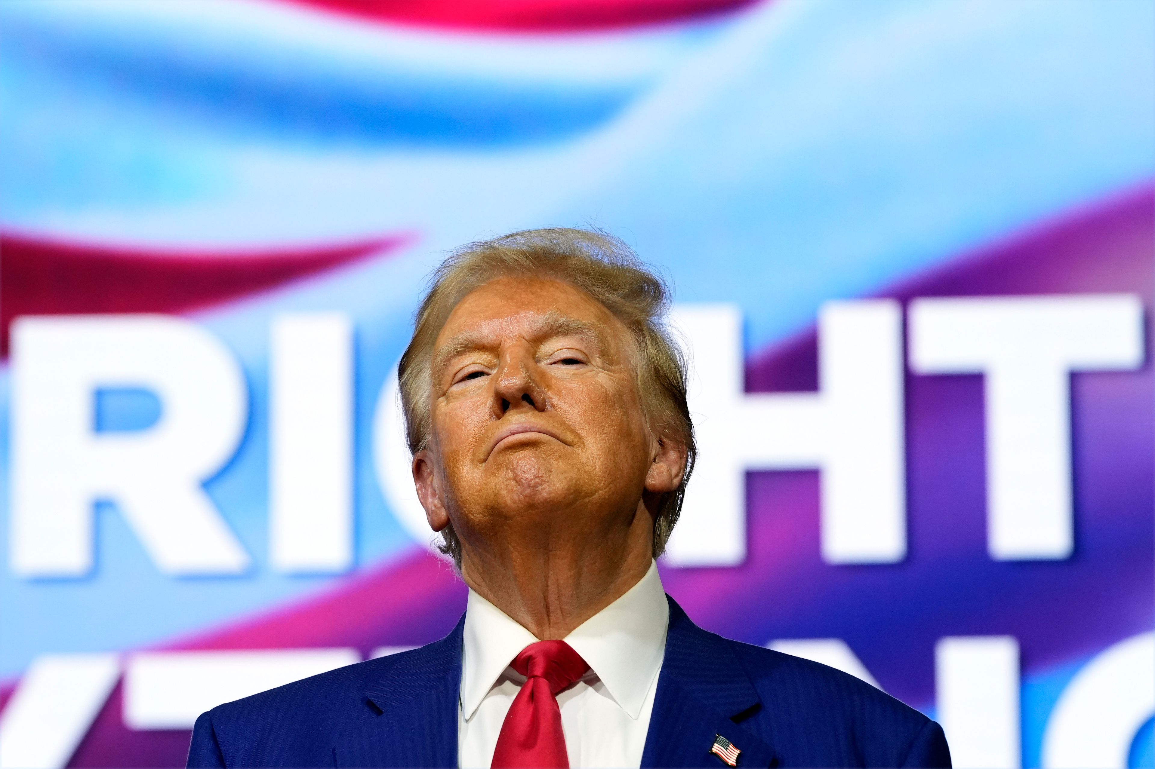 Republican presidential nominee former President Donald Trump listens at a campaign town hall at the Greater Philadelphia Expo Center & Fairgrounds, Monday, Oct. 14, 2024, in Oaks, Pa. (AP Photo/Alex Brandon)