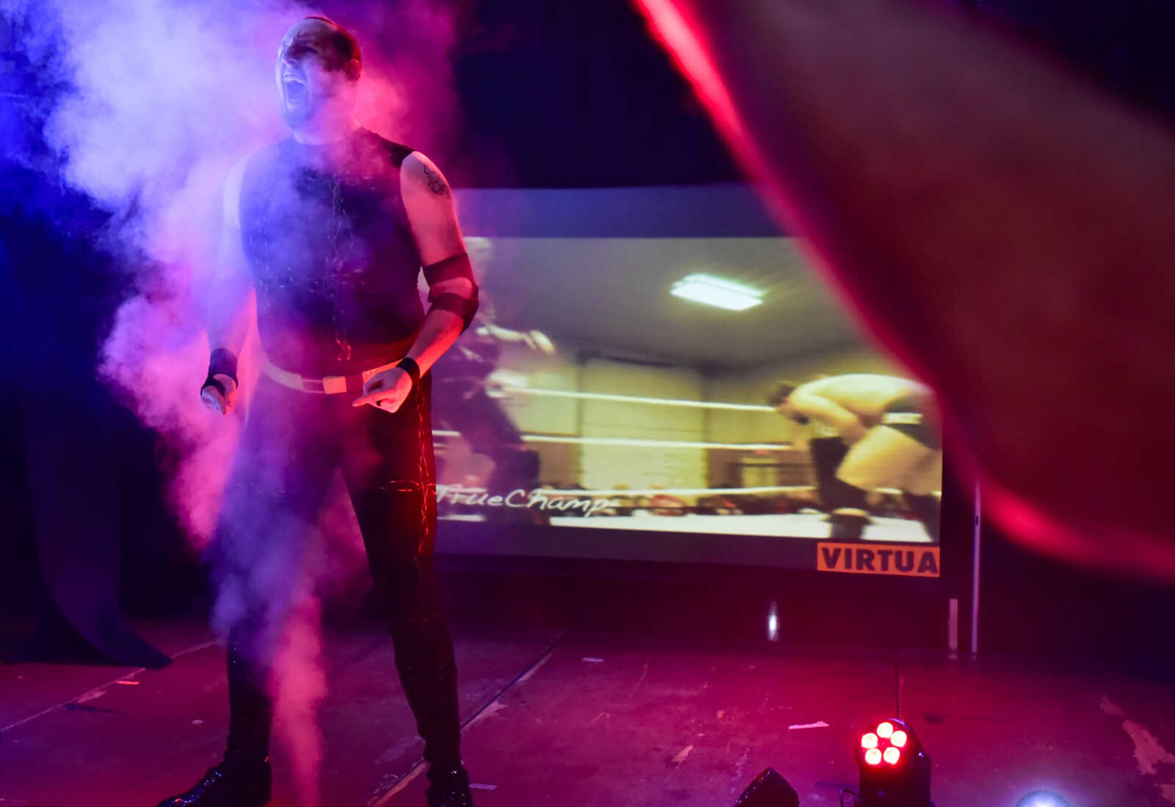 Brandon "Barbwire" Anderson makes his entrance before heading to the ring to start a 20-man battle royal in the One Night Riot event Saturday, Feb. 24, 2018, at the Arena Building in Cape Girardeau.