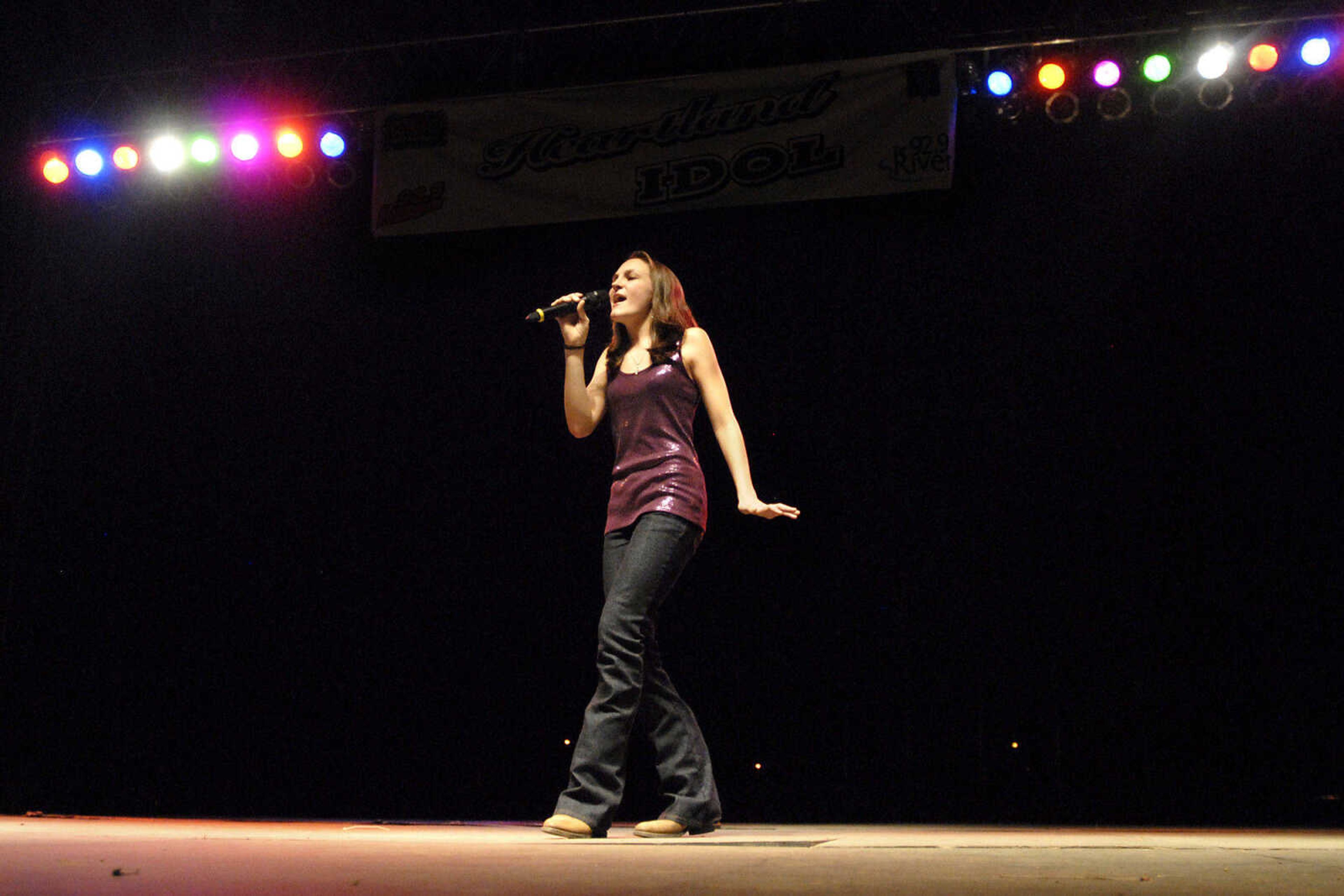 KRISTIN EBERTS ~ keberts@semissourian.com

Danielle Childers sings Lady Antebellum's "American Honey" during the youth portion of the 10th Annual Heartland Idol Finals at the 155th SEMO District Fair on Wednesday, Sept. 15, 2010, at Arena Park in Cape Girardeau.