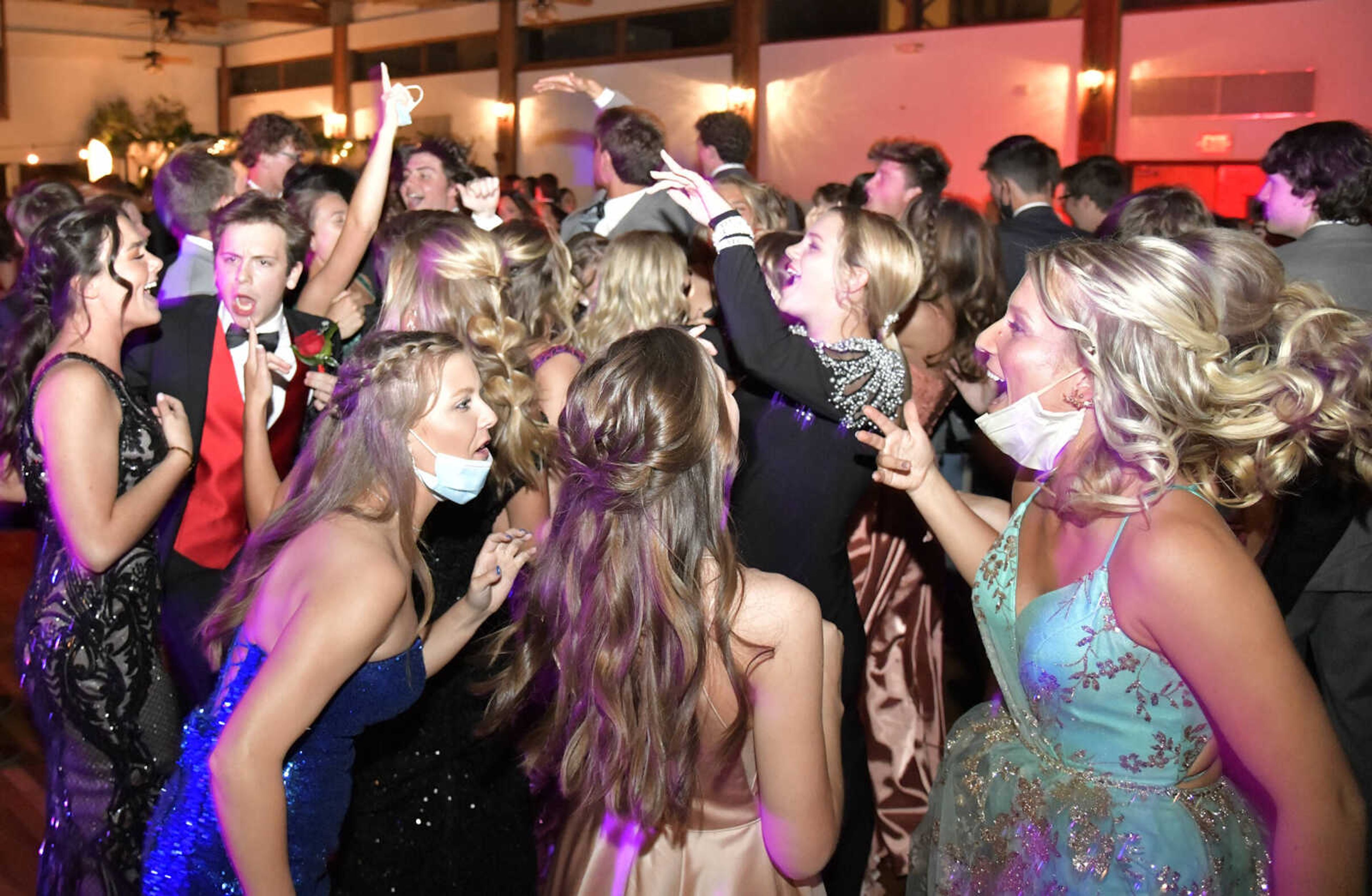 Students begin dancing during Notre Dame's prom at Bavarian Halle in Jackson on Friday, April 30, 2021.