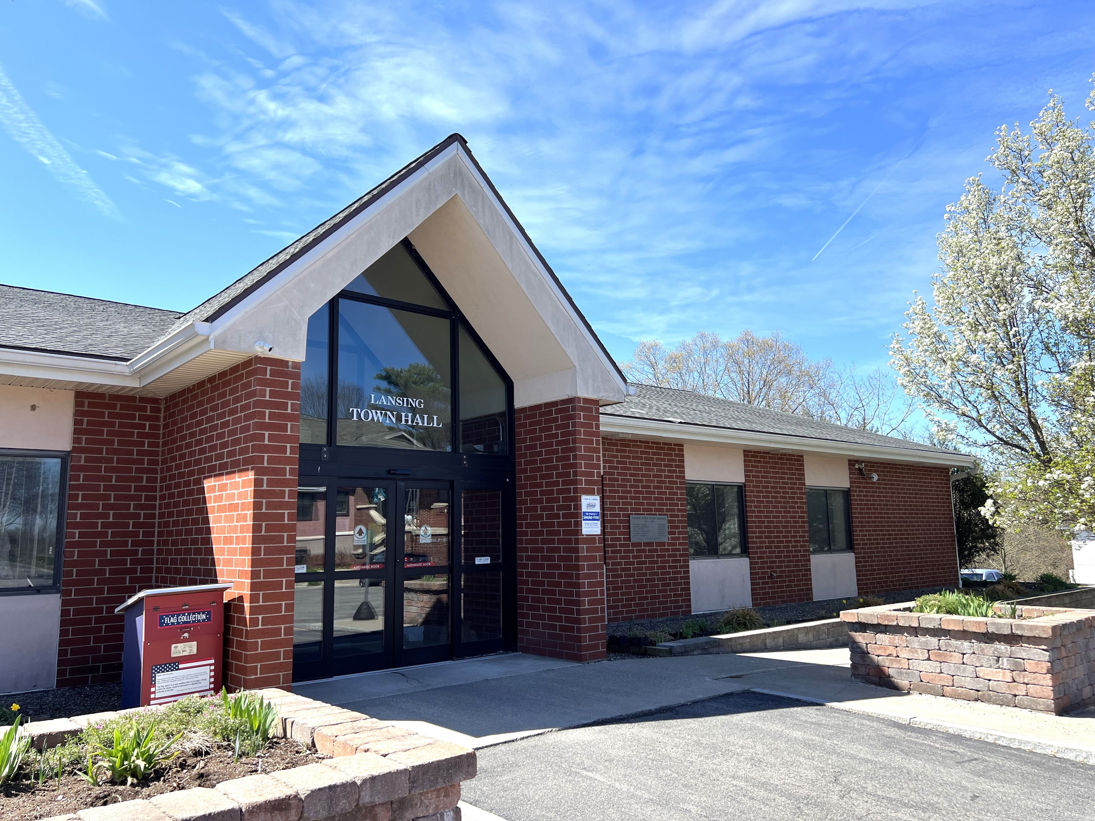 Lansing Town Hall, where officials approved an updated fee schedule for development applications, an interim measure aimed at better aligning costs with the town’s review process as broader zoning updates continue.