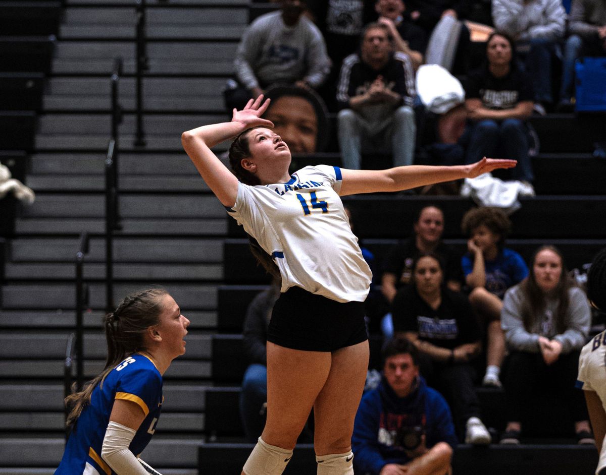 Lansing volleyball begins state title defense