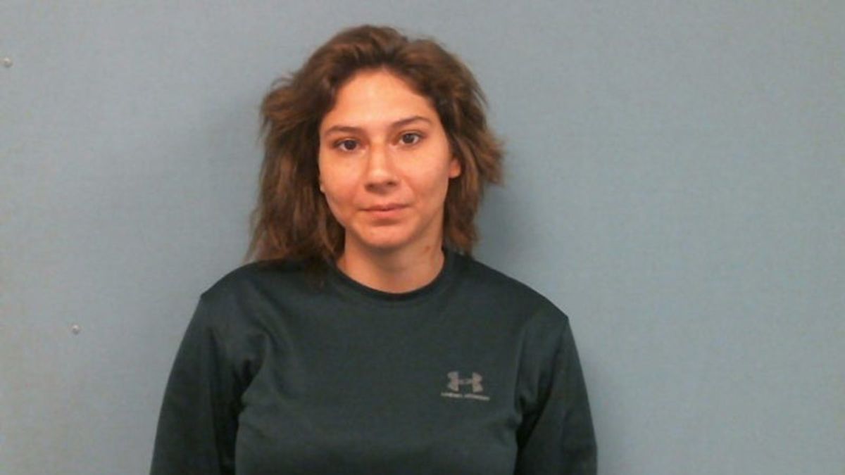 Woman indicted on murder charges in case of two bodies found...
