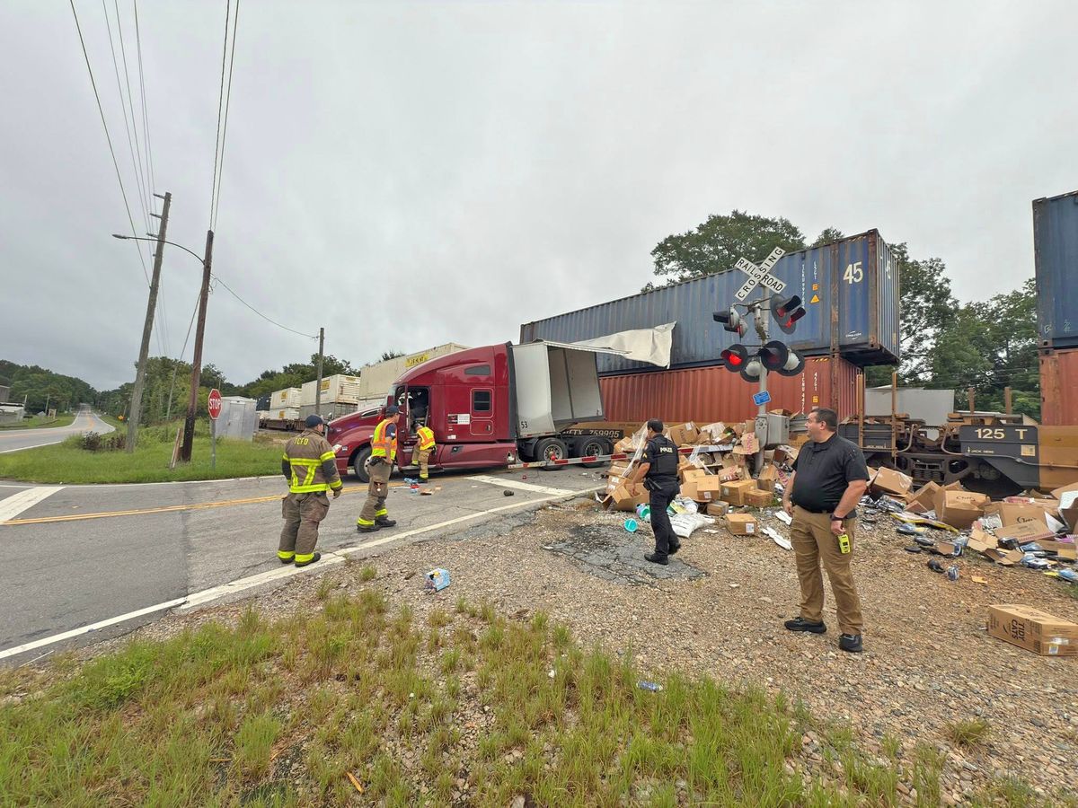 Train collides with semi stuck on tracks in Hogansville