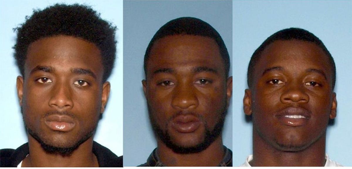 Murder suspect turns himself in; one still at large
