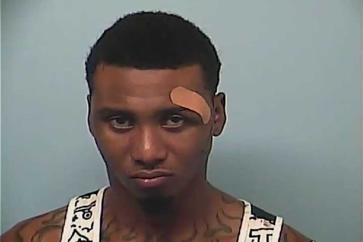 Man accused of pointing gun at 2