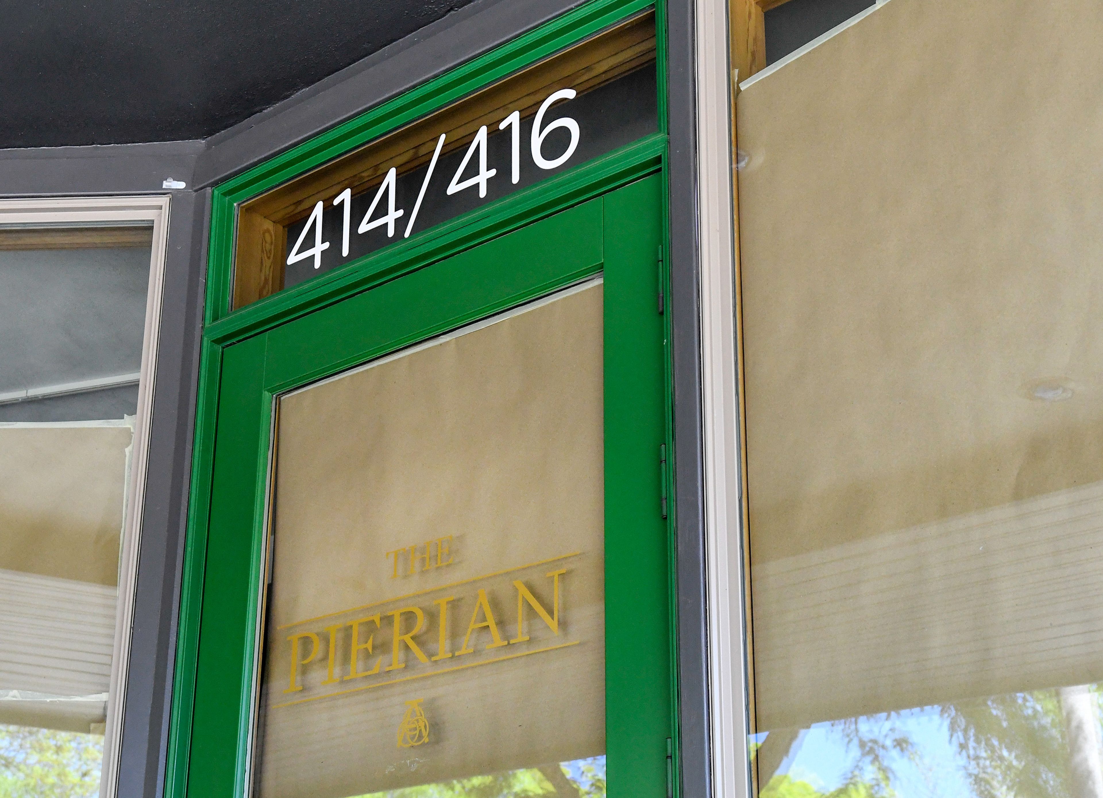 Gold lettering reads “The Pierian,” on the door of the former Moscow Contemporary space in downtown Moscow on Wednesday.