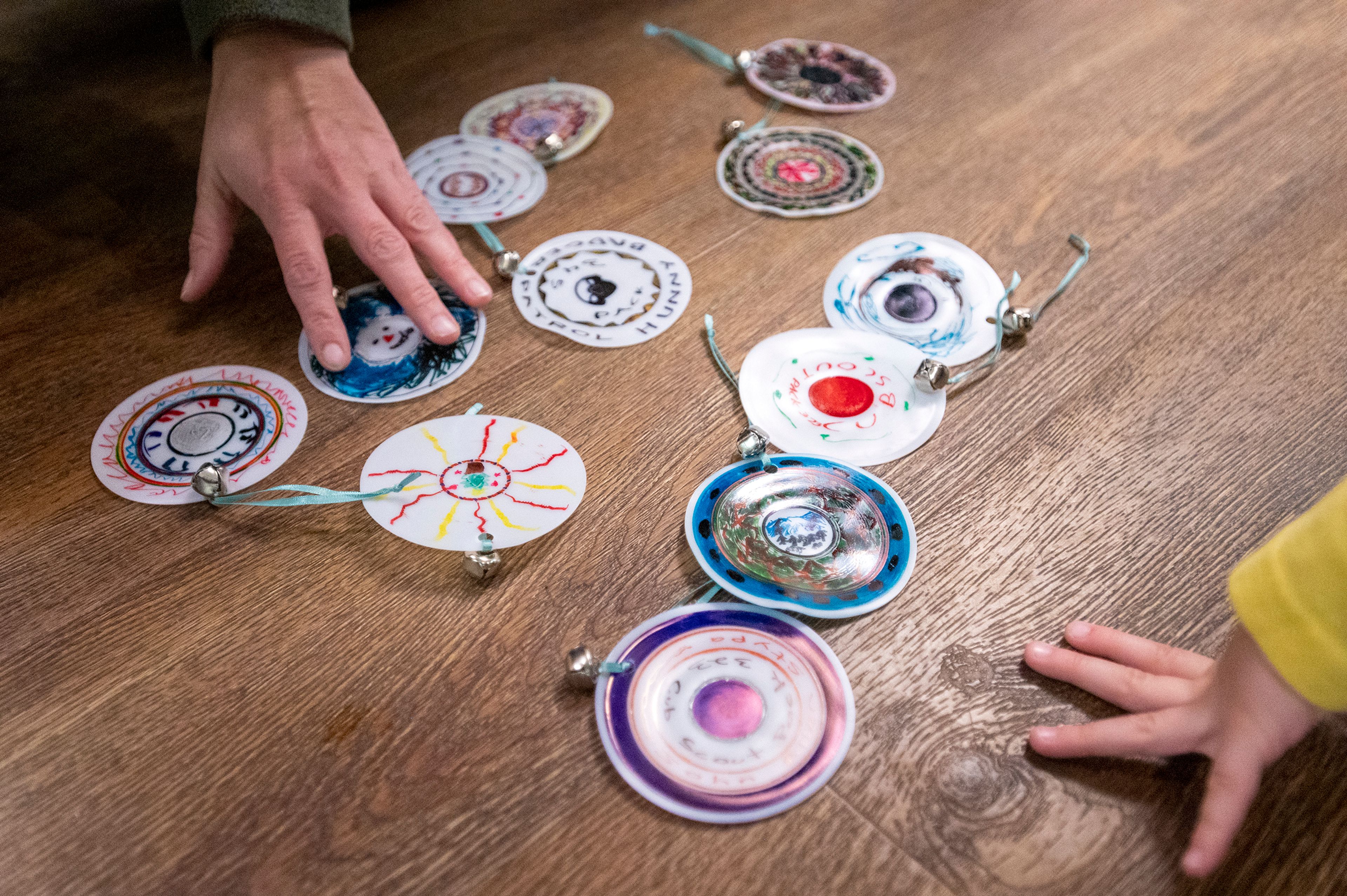 Ornaments made by the Boy Scout members are displayed on the ground at Aspen Park of Cascadia in Moscow on Wednesday.