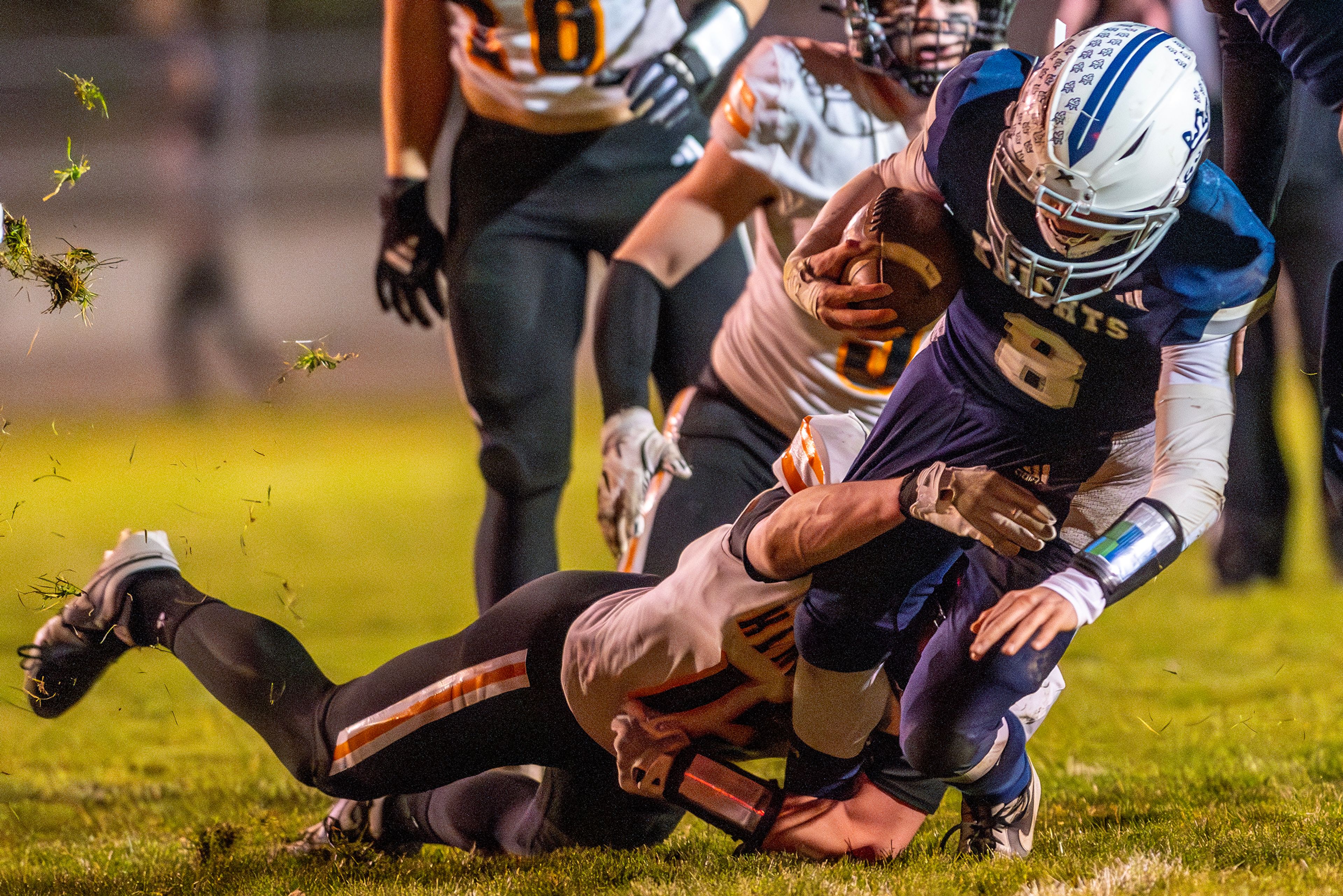 Logos quarterback Seamus Wilson is tackled by Kendrick linebacker Xavier Carpenter in a semifinal game of the Idaho State Football Class 2A Championships Friday at Bengal Field in Lewiston.